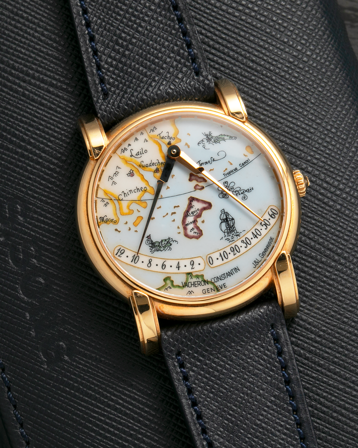 Brand: Vacheron Constantin
Year: 1998
Model: Mercator
Reference Number: 43050
Material: 18-carat Rose Gold Case, Champlevé Enamel Dial
Movement: Vacheron Constantin Cal. 1120/2 (Heavily-Modified Jaeger LeCoultre Cal. 920 Ébauche), Self-Winding
Case Dimensions: 36mm x 9mm (Lug-to-Lug 41mm)
Lug Width: 20mm
Strap: Molequin Dark Navy Textured Calf Leather Strap with Signed 18-carat Yellow Gold Deployant Buckle, extra Vacheron Constantin Black Alligator Leather Strap (Used)