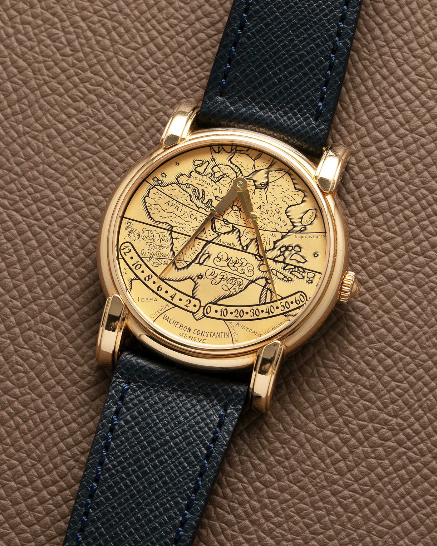 Brand: Vacheron Constantin Year: 1994 Model: Mercator Reference Number: 43050 Material: 18-carat Yellow Gold Case and Engraved Dial filled with Black Enamel Movement: Vacheron Constantin Cal. 1120 M, Self-Winding Case Diameter: 36mm Strap: Molequin Navy Blue Textured Calf Leather Strap with Signed 18-carat Yellow Gold Deployant