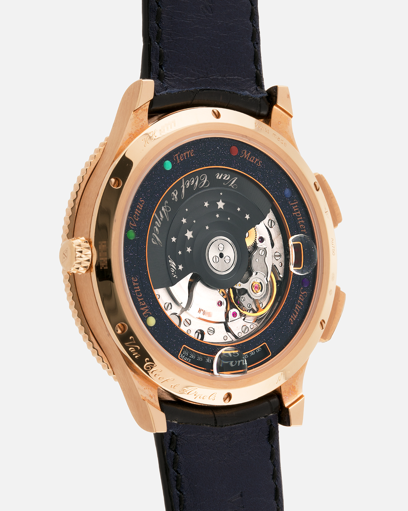 Brand: Van Cleef & Arpels
Year: 2015
Model: Midnight Planetarium
Reference Number: VCARO4J000
Material: 18k Rose Gold
Movement: Automatic Roger Dubuis-derived Stern Manufacture Base Calibre With an Exclusive Planetarium Module Developed By Christian Van Der Klaauw
Case Dimensions: 44mm Diameter 13.8mm Thickness
Strap: Van Cleef & Arpels Black Alligator Strap With Signed 18k Pink Gold Deployant Clasp