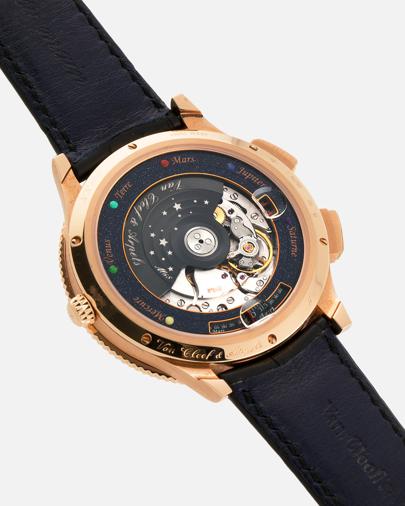 Brand: Van Cleef & Arpels
Year: 2015
Model: Midnight Planetarium
Reference Number: VCARO4J000
Material: 18k Rose Gold
Movement: Automatic Roger Dubuis-derived Stern Manufacture Base Calibre With an Exclusive Planetarium Module Developed By Christian Van Der Klaauw
Case Dimensions: 44mm Diameter 13.8mm Thickness
Strap: Van Cleef & Arpels Black Alligator Strap With Signed 18k Pink Gold Deployant Clasp
