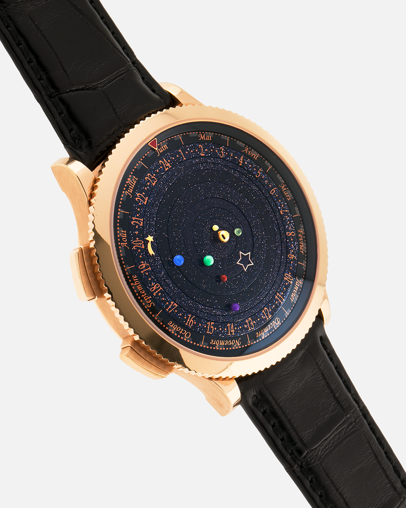 Brand: Van Cleef & Arpels
Year: 2015
Model: Midnight Planetarium
Reference Number: VCARO4J000
Material: 18k Rose Gold
Movement: Automatic Roger Dubuis-derived Stern Manufacture Base Calibre With an Exclusive Planetarium Module Developed By Christian Van Der Klaauw
Case Dimensions: 44mm Diameter 13.8mm Thickness
Strap: Van Cleef & Arpels Black Alligator Strap With Signed 18k Pink Gold Deployant Clasp