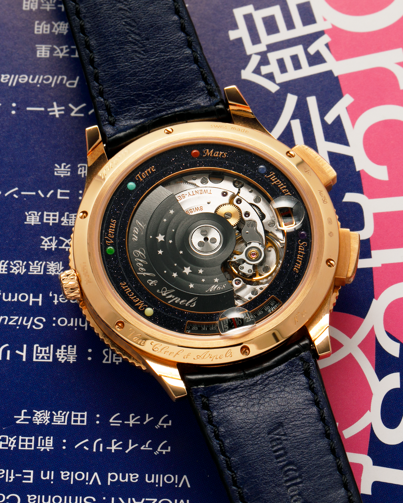 Brand: Van Cleef & Arpels
Year: 2015
Model: Midnight Planetarium
Reference Number: VCARO4J000
Material: 18k Rose Gold
Movement: Automatic Roger Dubuis-derived Stern Manufacture Base Calibre With an Exclusive Planetarium Module Developed By Christian Van Der Klaauw
Case Dimensions: 44mm Diameter 13.8mm Thickness
Strap: Van Cleef & Arpels Black Alligator Strap With Signed 18k Pink Gold Deployant Clasp