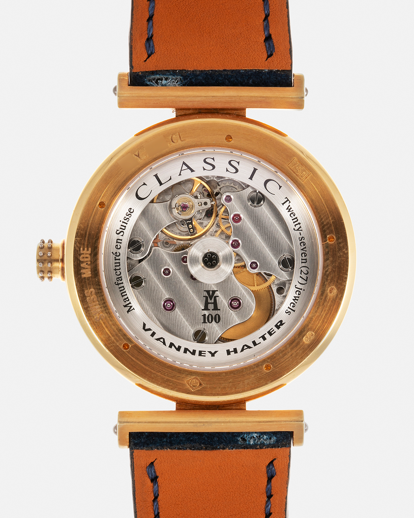Brand: Vianney Halter Year: 2000’s Model: Classic Material: 18k Yellow Gold Movement: Modified Lemania 8810 with mystery motor Case Diameter: 36mm Bracelet/Strap: Blue Suede strap with Yellow Gold Tang Buckle