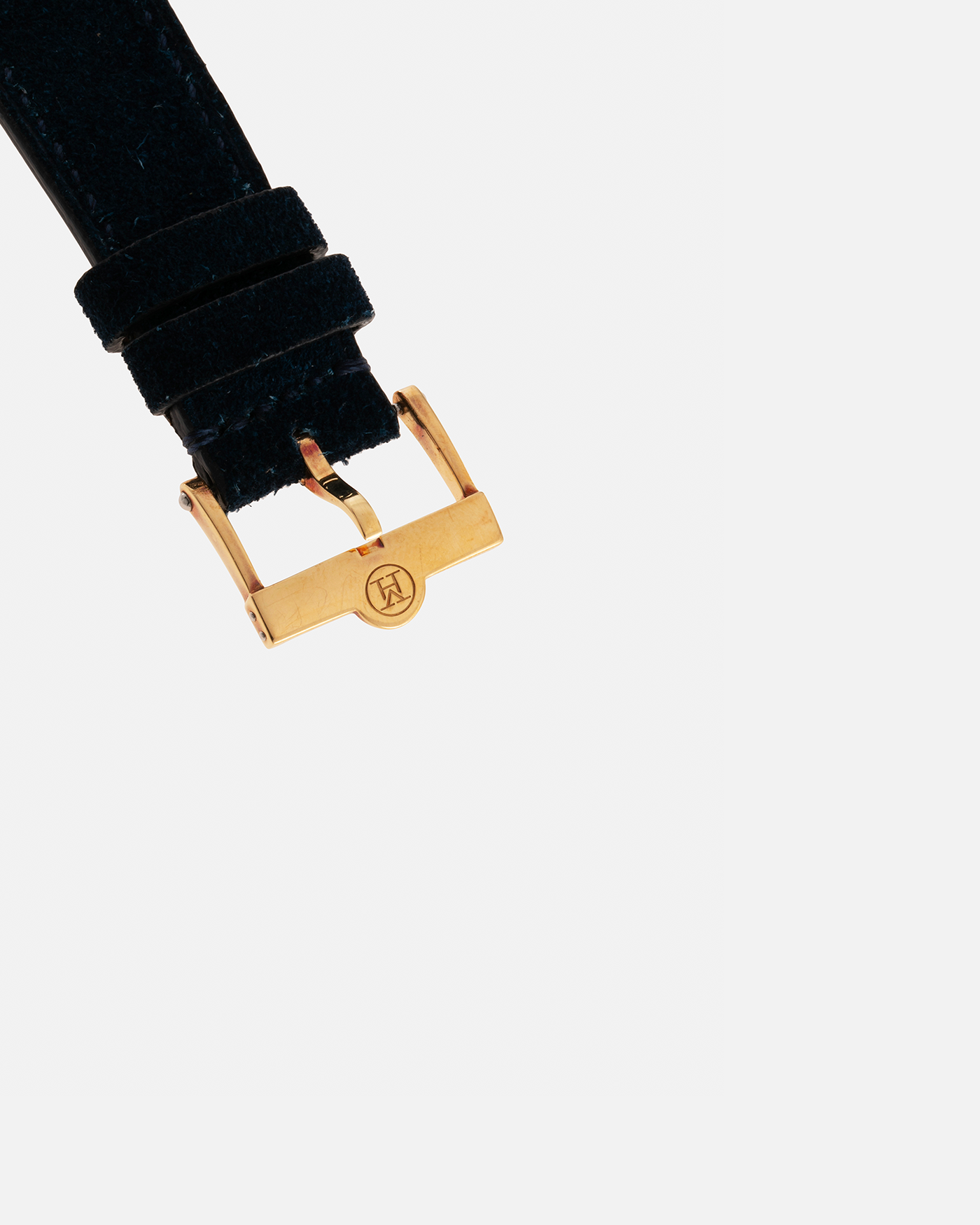 Brand: Vianney Halter Year: 2000’s Model: Classic Material: 18k Yellow Gold Movement: Modified Lemania 8810 with mystery motor Case Diameter: 36mm Bracelet/Strap: Blue Suede strap with Yellow Gold Tang Buckle