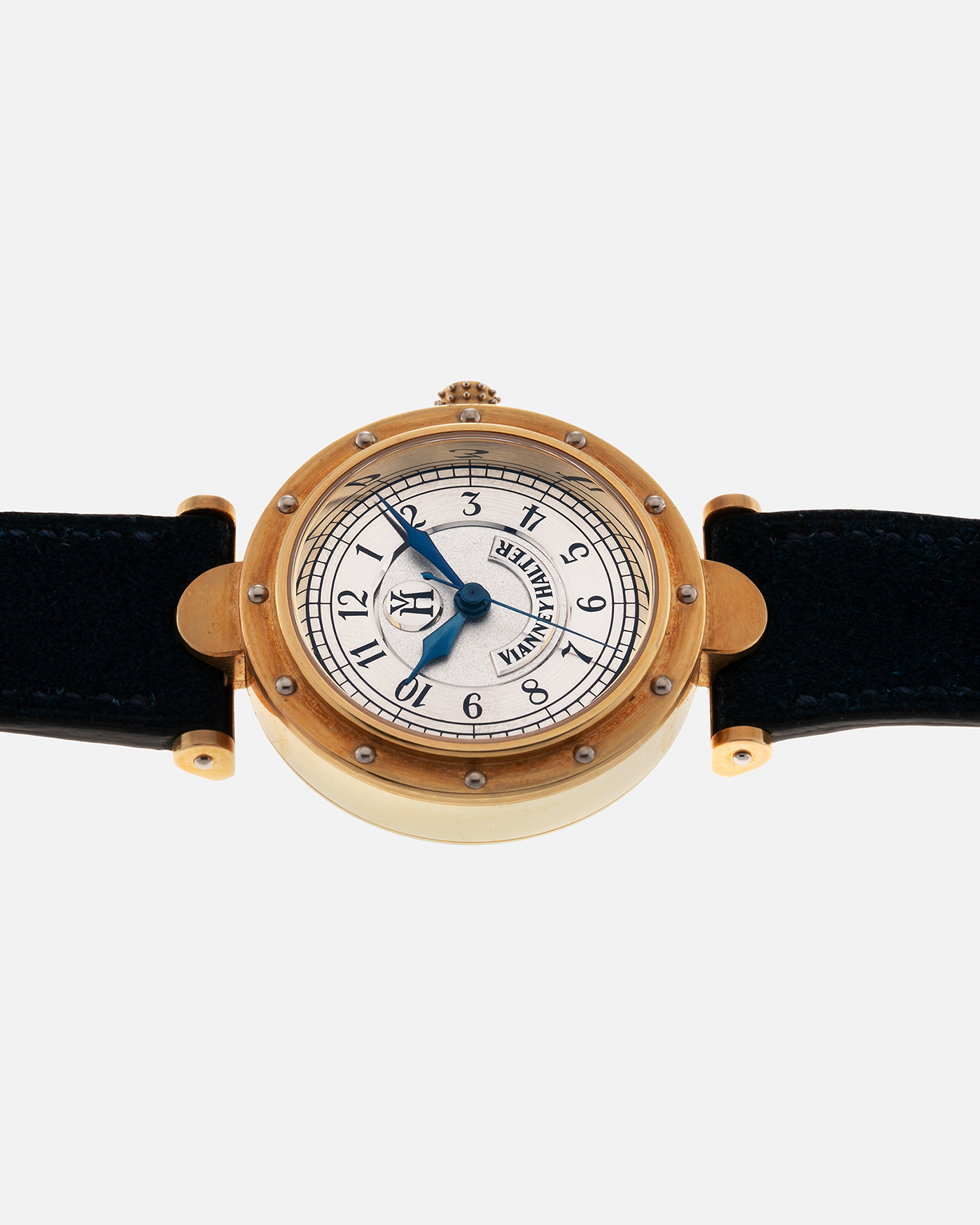 Brand: Vianney Halter Year: 2000’s Model: Classic Material: 18k Yellow Gold Movement: Modified Lemania 8810 with mystery motor Case Diameter: 36mm Bracelet/Strap: Blue Suede strap with Yellow Gold Tang Buckle