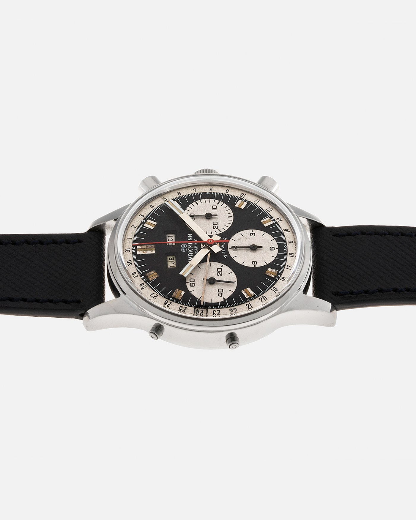 Brand: Wakmann Year: 1970’s Model: Triple Calendar Chronograph Reference Number: 71.1309.70 Material: Stainless Steel Movement: Valjoux Cal. 723, Manual-Winding Case Diameter: 37mm Lug Width: 20mm Strap: Molequin Navy Blue Textured Calf Leather Strap