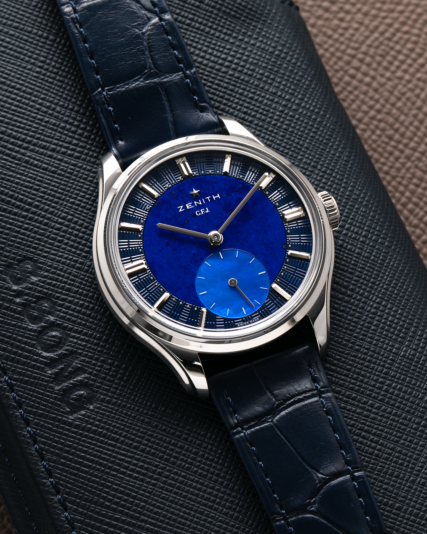 Brand: Zenith
Year: 2026
Model: G.F.J.
Reference Number: 40.1865.0135/51.C200
Material: Platinum 950
Movement: Caliber 135
Case Diameter: 39.15mm Diameter 10.5mm Thickness
Strap: Zenith Blue Alligator Strap with Platinum Zenith Tang Buckle