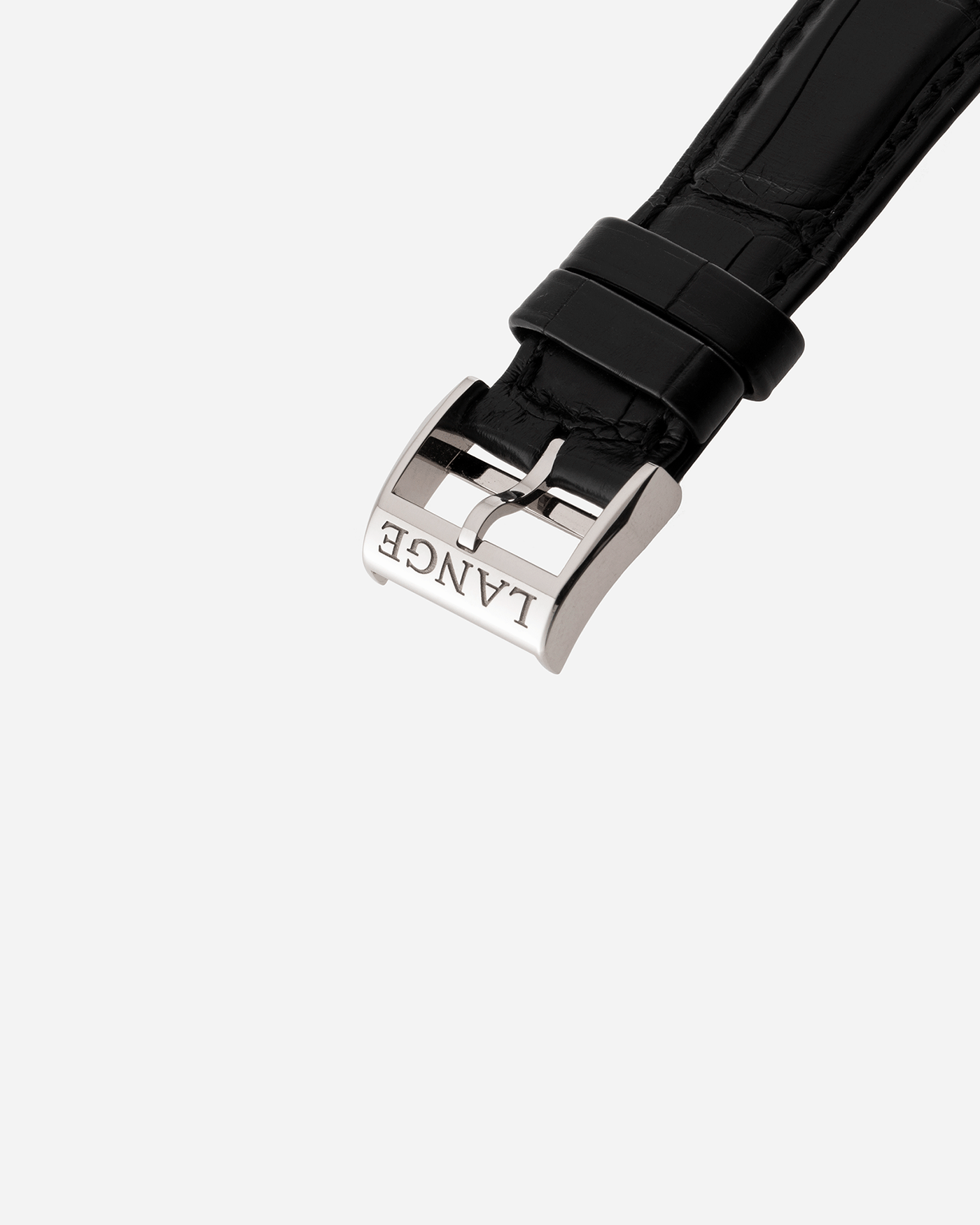Brand: A. Lange & Sohne Year: 2010’s Model: 1815 Annual Calendar Ref Number: 235.026 Material: 18k White Gold Movement: Manual Winding In-House Cal. L051.1 Case Diameter: 38mm Bracelet/Strap: A. Lange & Sohne Black Alligator Strap with signed 18k White Gold Tang Buckle