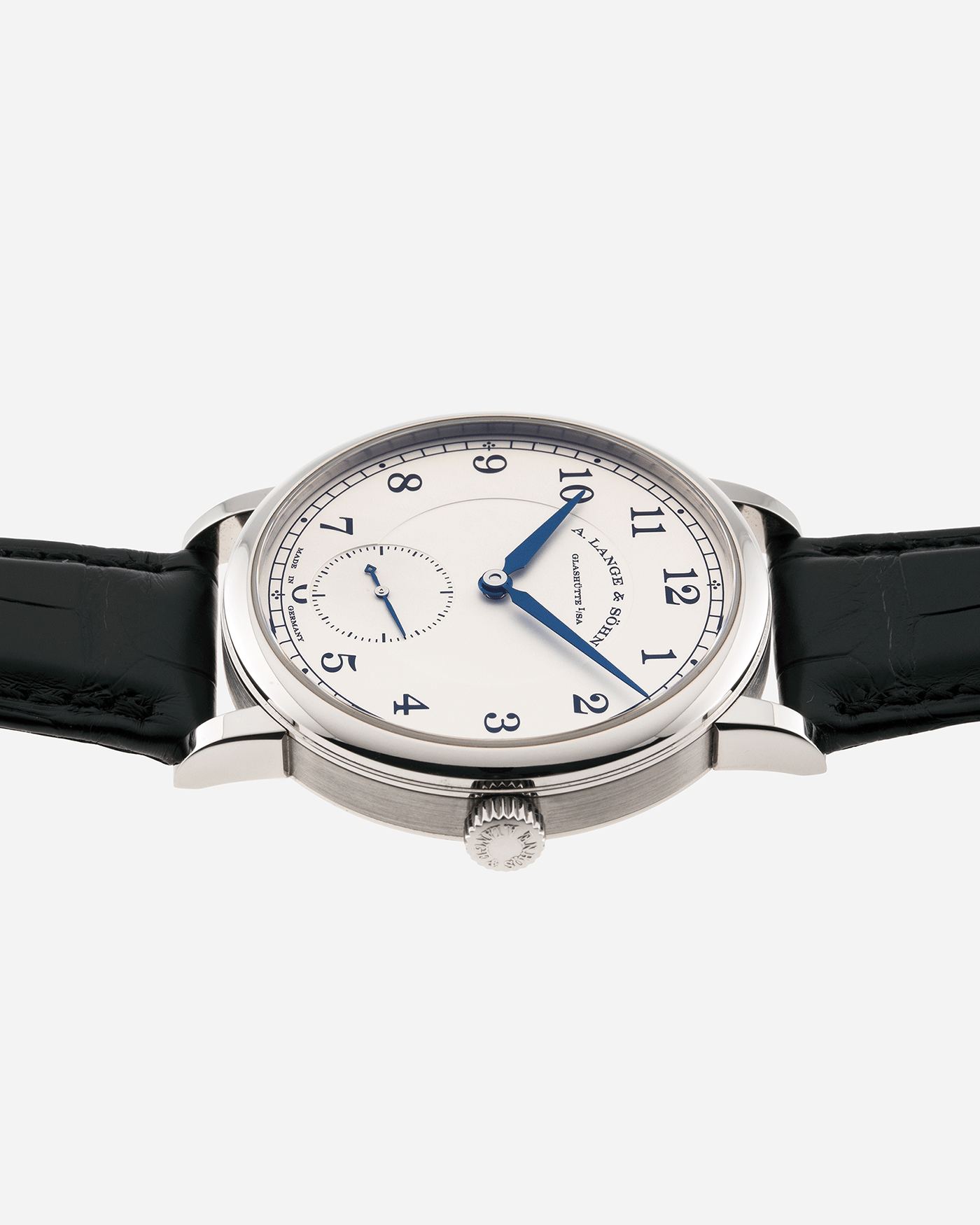 Brand: A. Lange & Sohne Year: 2010’s Model: 1815 Annual Calendar Ref Number: 235.026 Material: 18k White Gold Movement: Manual Winding In-House Cal. L051.1 Case Diameter: 38mm Bracelet/Strap: A. Lange & Sohne Black Alligator Strap with signed 18k White Gold Tang Buckle