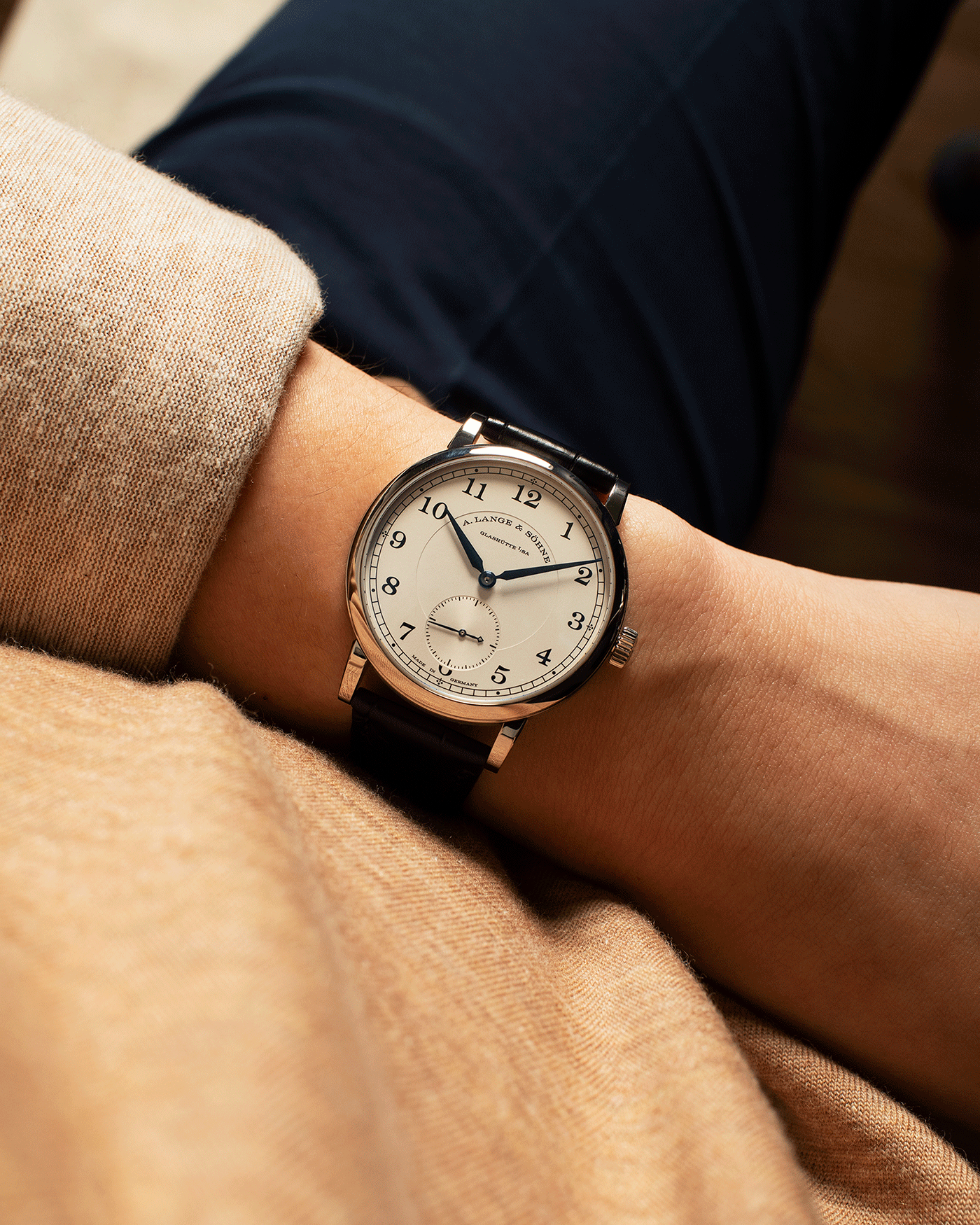 Brand: A. Lange & Sohne Year: 2010’s Model: 1815 Annual Calendar Ref Number: 235.026 Material: 18k White Gold Movement: Manual Winding In-House Cal. L051.1 Case Diameter: 38mm Bracelet/Strap: A. Lange & Sohne Black Alligator Strap with signed 18k White Gold Tang Buckle