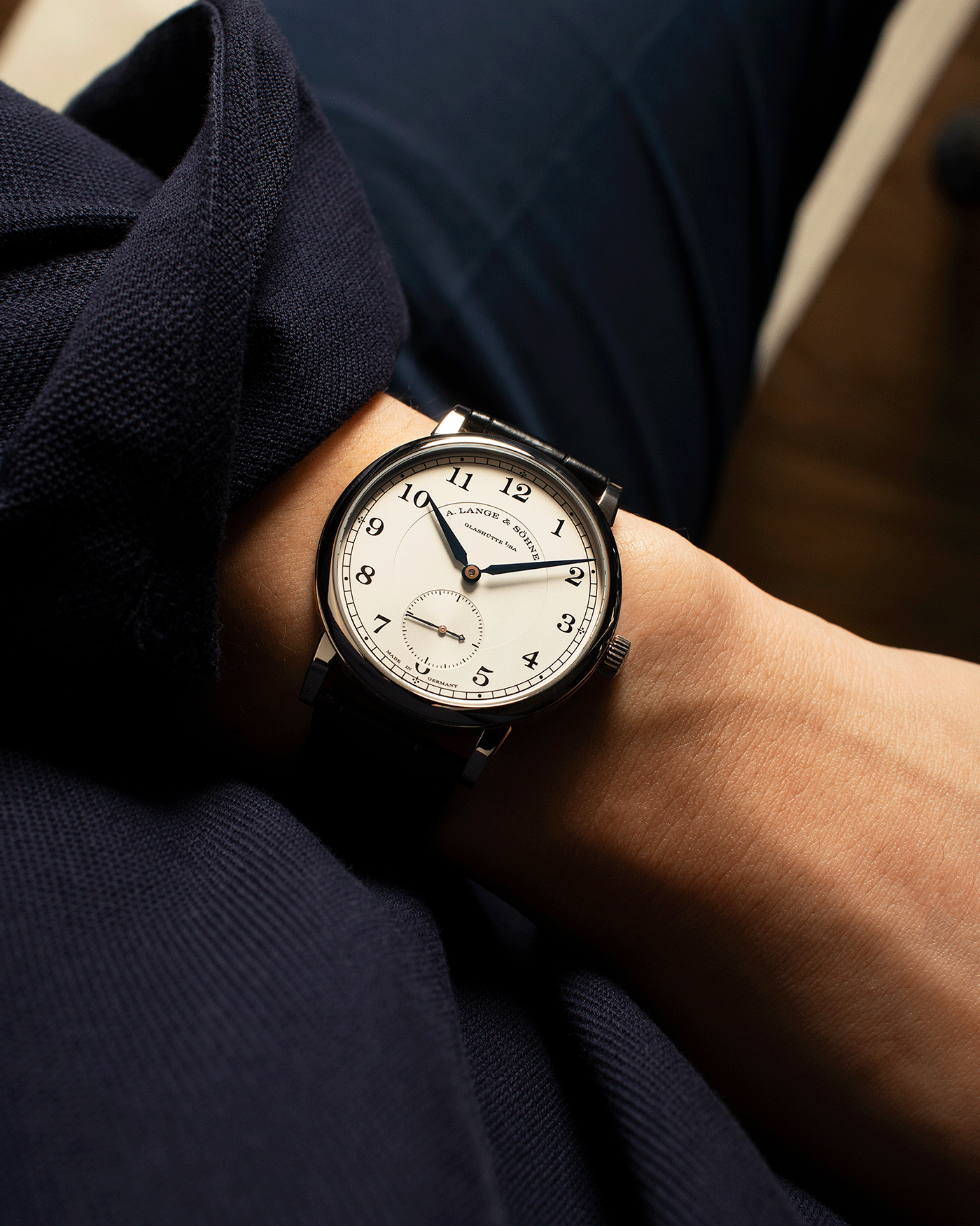 Brand: A. Lange & Sohne Year: 2010’s Model: 1815 Annual Calendar Ref Number: 235.026 Material: 18k White Gold Movement: Manual Winding In-House Cal. L051.1 Case Diameter: 38mm Bracelet/Strap: A. Lange & Sohne Black Alligator Strap with signed 18k White Gold Tang Buckle