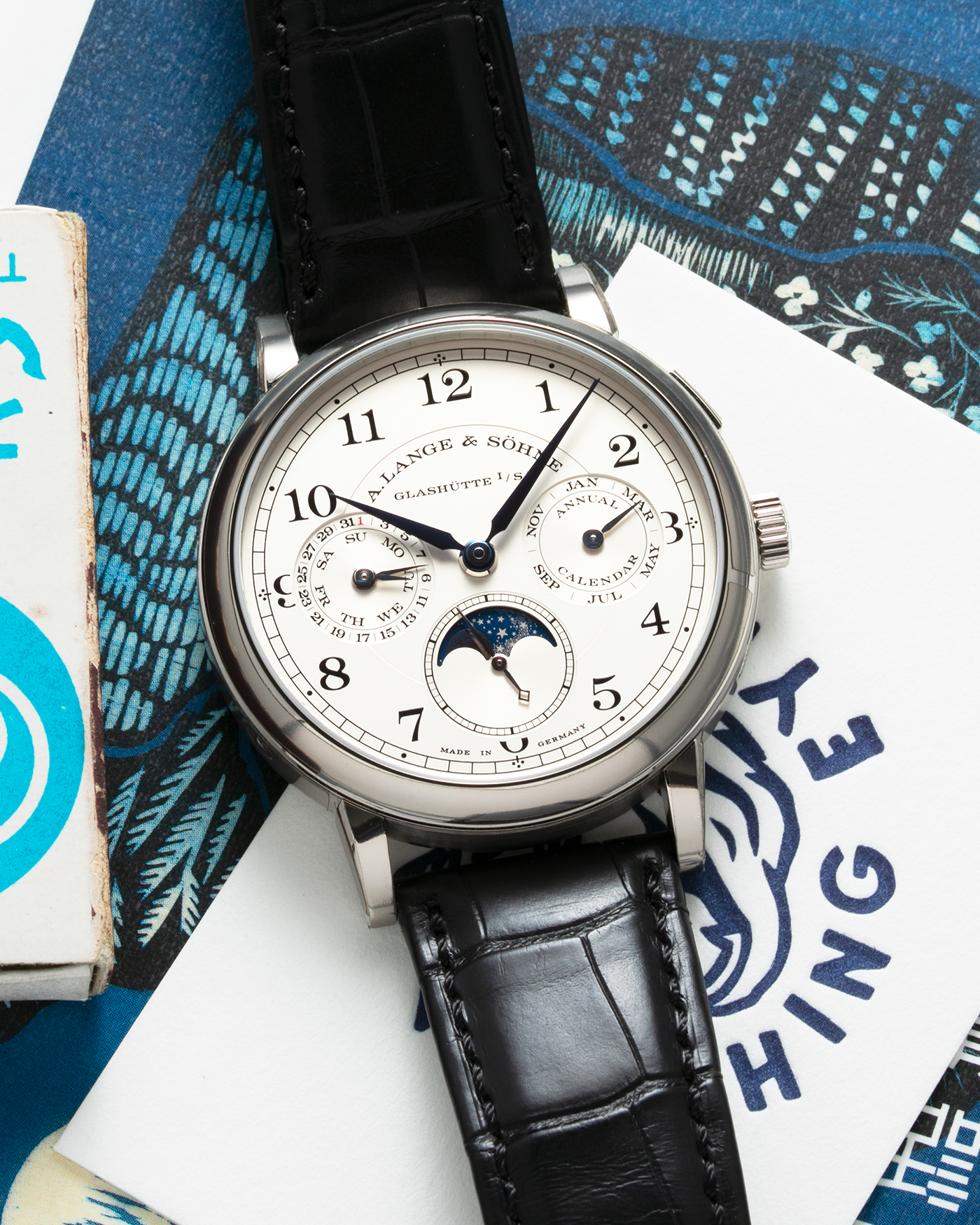 Brand: A. Lange & Sohne Year: 2018 Model: 1815 Annual Calendar Material: 18k White Gold Movement: Manual Winding L051.3 Case Diameter: 40mm Bracelet/Strap: A. Lange & Sohne Black Alligator Strap with signed 18k White Gold Tang Buckle