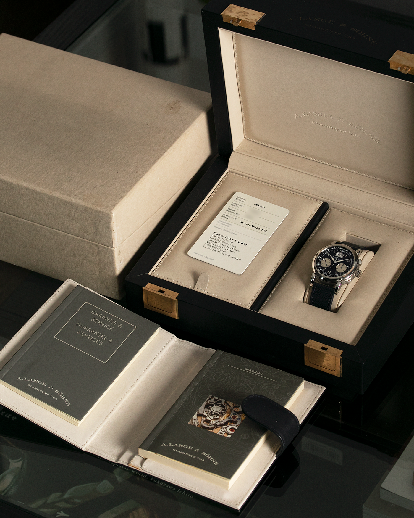 Brand: A. Lange & Sohne Year: 2000’s Model: Datograph Reference Number: 403.035 Material: Platinum Movement: Manual Winding L951.1 Case Diameter: 39mm Bracelet/Strap: Molequin Navy Textured Calf and A. Lange & Sohne Platinum Tang Buckle