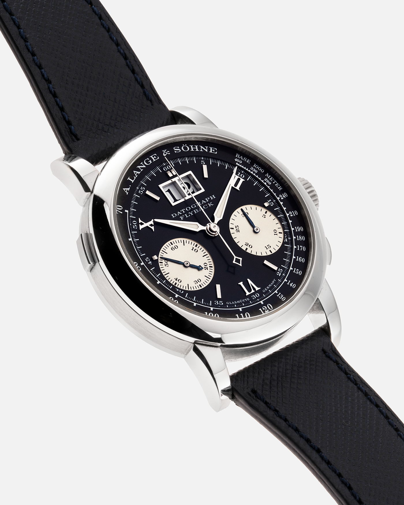 Brand: A. Lange & Sohne Year: 2000’s Model: Datograph Reference Number: 403.035 Material: Platinum Movement: Manual Winding L951.1 Case Diameter: 39mm Bracelet/Strap: Molequin Navy Textured Calf and A. Lange & Sohne Platinum Tang Buckle