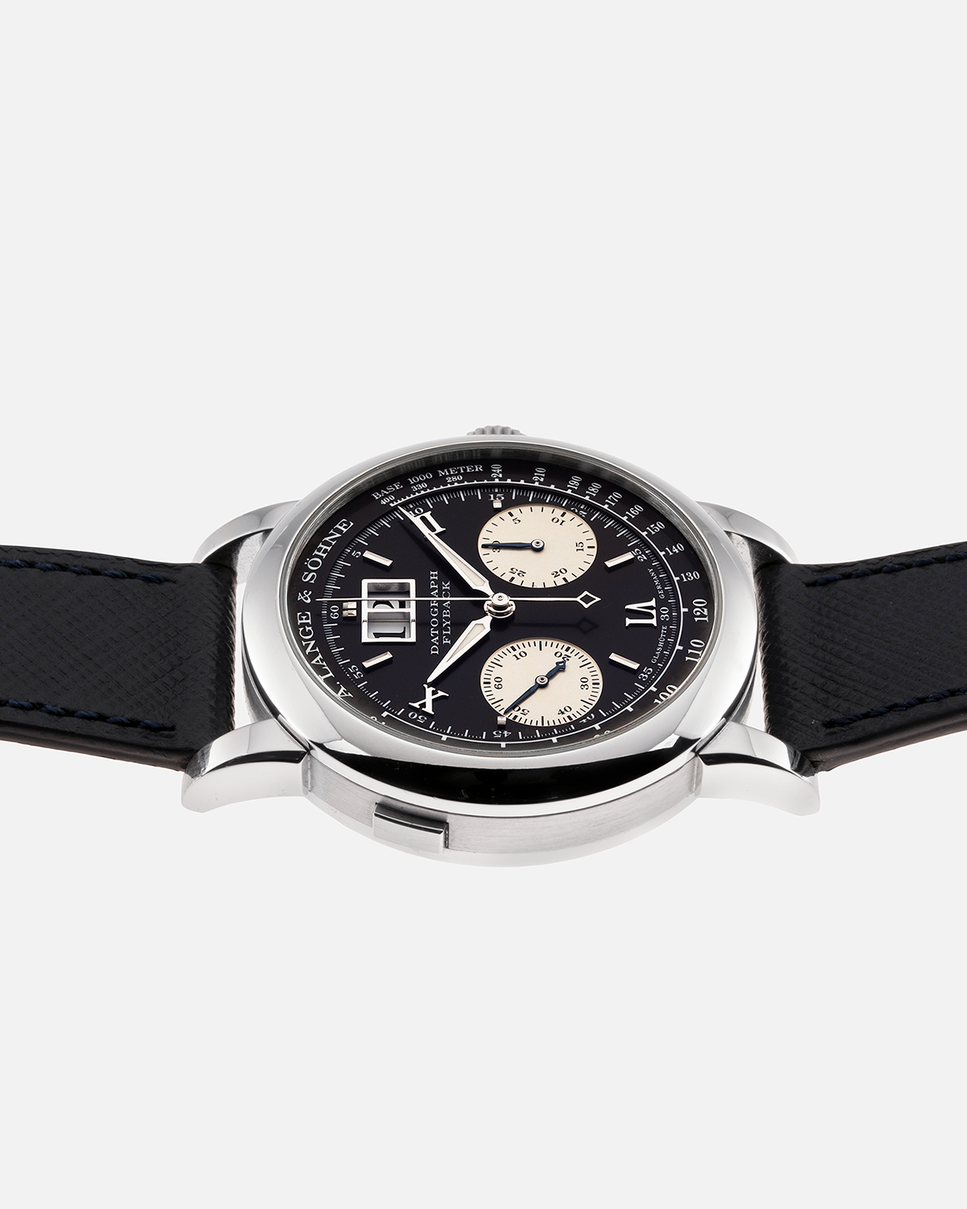 Brand: A. Lange & Sohne Year: 2000’s Model: Datograph Reference Number: 403.035 Material: Platinum Movement: Manual Winding L951.1 Case Diameter: 39mm Bracelet/Strap: Molequin Navy Textured Calf and A. Lange & Sohne Platinum Tang Buckle