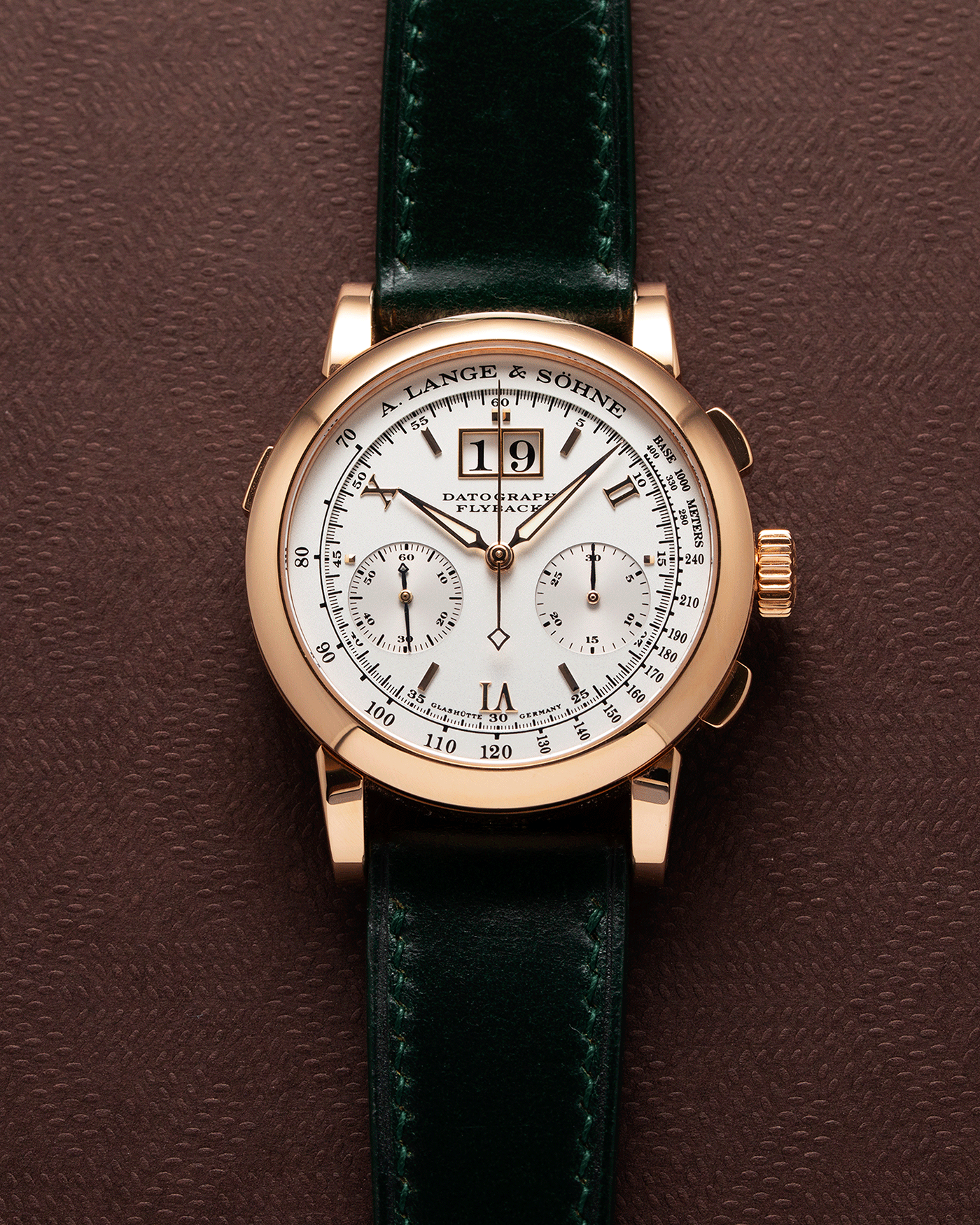 Brand: A. Lange & Sohne Year: 2009 Model: Datograph Reference Number: 403.032 Material: 18k Rose Gold Movement: Manual Winding L951.1 Case Diameter: 39mm Bracelet/Strap: Delugs Green Leather Strap with signed 18k Rose Gold Tang Buckle