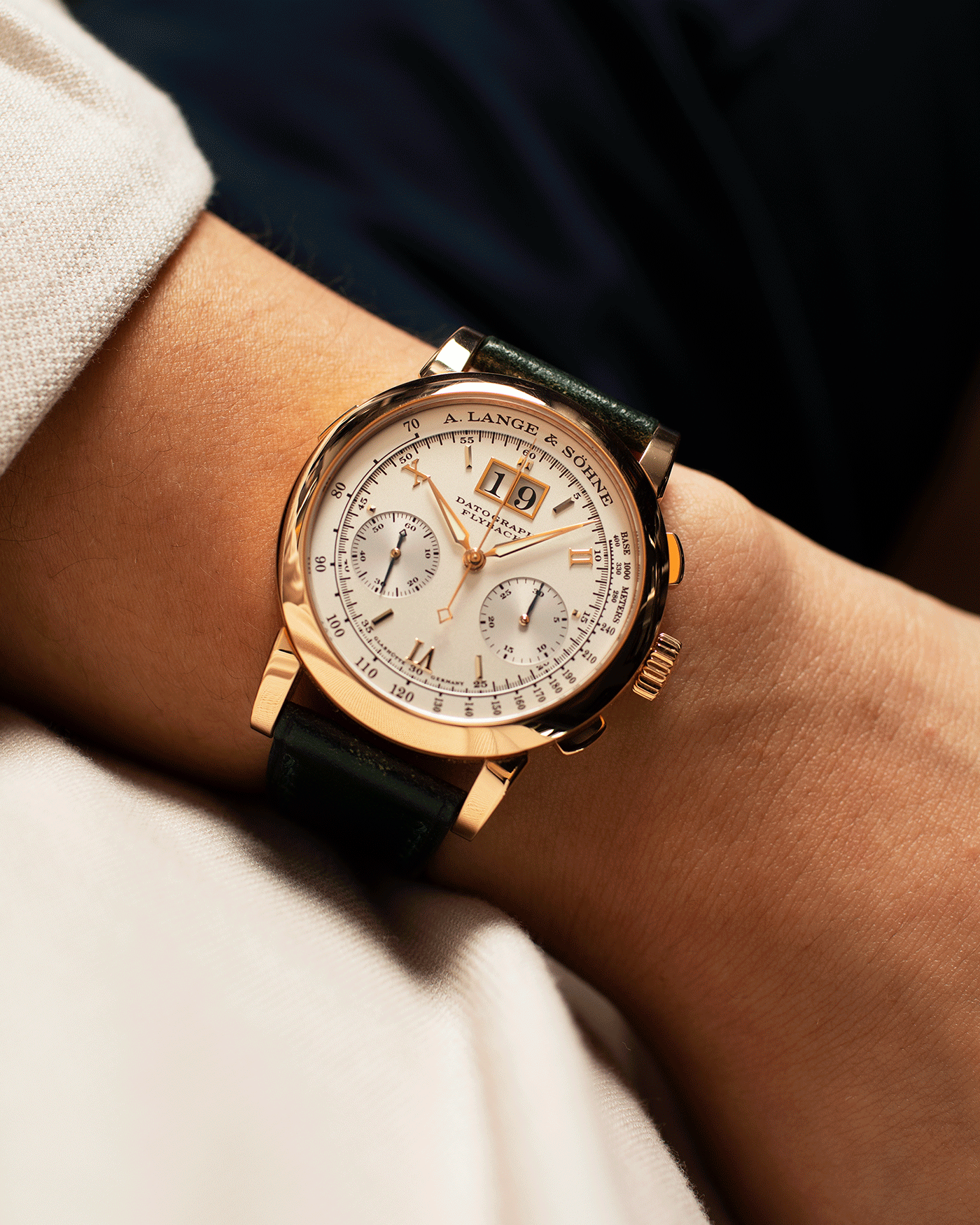 Brand: A. Lange & Sohne Year: 2009 Model: Datograph Reference Number: 403.032 Material: 18k Rose Gold Movement: Manual Winding L951.1 Case Diameter: 39mm Bracelet/Strap: Delugs Green Leather Strap with signed 18k Rose Gold Tang Buckle