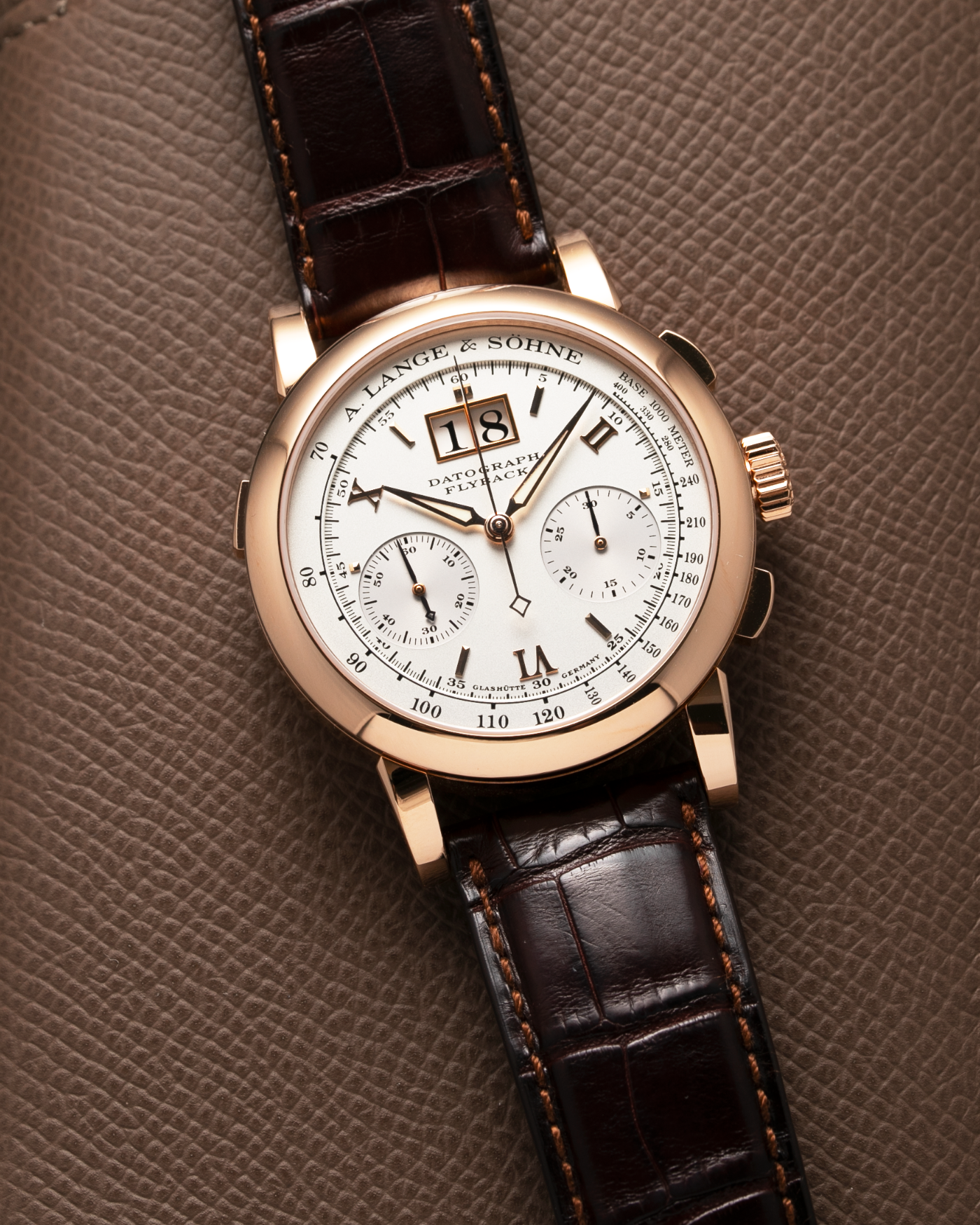 Brand: A. Lange & Sohne Year: 2000’s Model: Datograph Reference Number: 403.032 Material: 18k Rose Gold Movement: Manual Winding L951.1 Case Diameter: 39mm Bracelet/Strap: A. Lange & Sohne Brown Alligator and 18k Rose Gold Tang Buckle