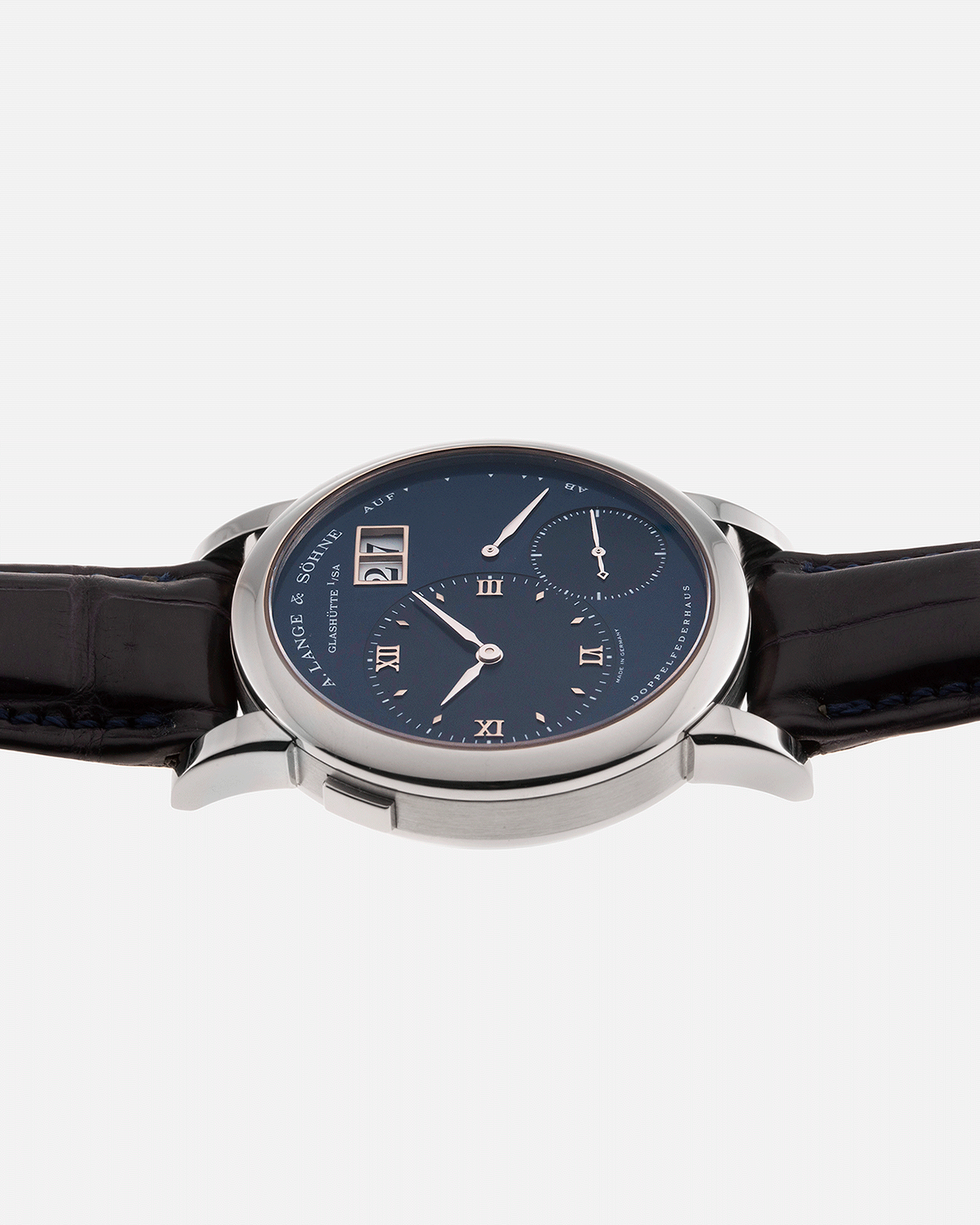 Brand: A. Lange & Sohne Year: 2000’s Model: Lange 1 Reference Number: 101.027 Material: 18k White Gold Movement: Manual Winding L901.5 Case Diameter: 38.5mm Bracelet/Strap: Blue Alligator Strap with 18k White Gold A. Lange & Sohne Tang Buckle