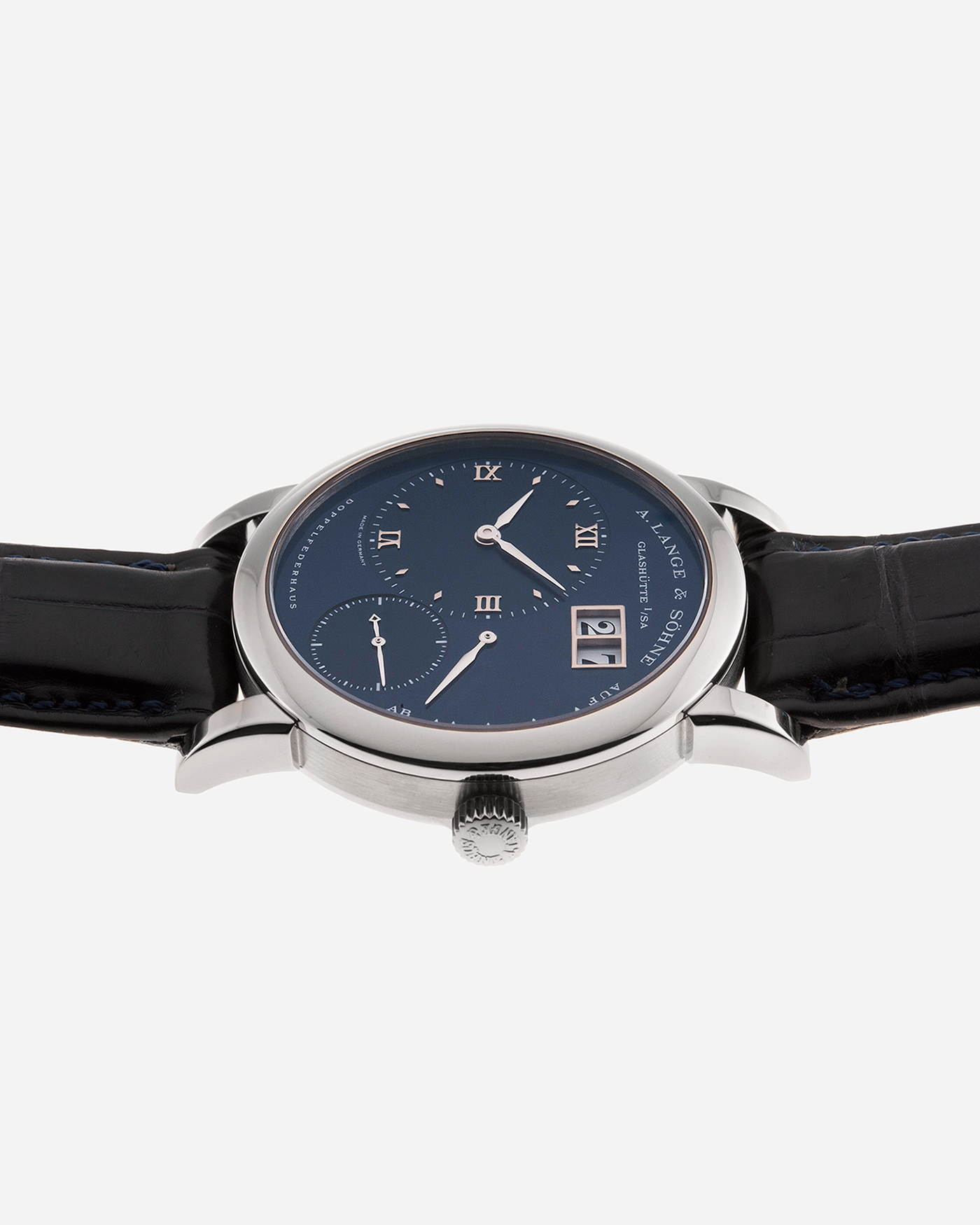 Brand: A. Lange & Sohne Year: 2000’s Model: Lange 1 Reference Number: 101.027 Material: 18k White Gold Movement: Manual Winding L901.5 Case Diameter: 38.5mm Bracelet/Strap: Blue Alligator Strap with 18k White Gold A. Lange & Sohne Tang Buckle