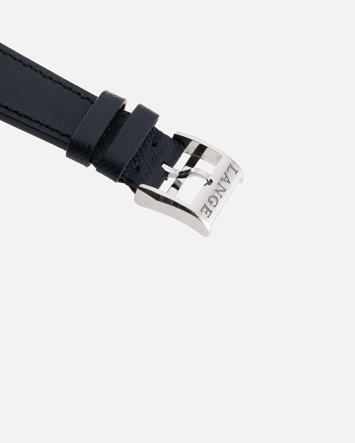 Brand: A. Lange & Sohne Year: 2000’s Model: Lange 1  Reference Number: 101.027 Material: 18k White Gold Movement: Manual Winding L901.5 Case Diameter: 38.5mm Bracelet/Strap: Molequin Navy Blue Textured Calf with 18k White Gold A. Lange & Sohne Tang Buckle