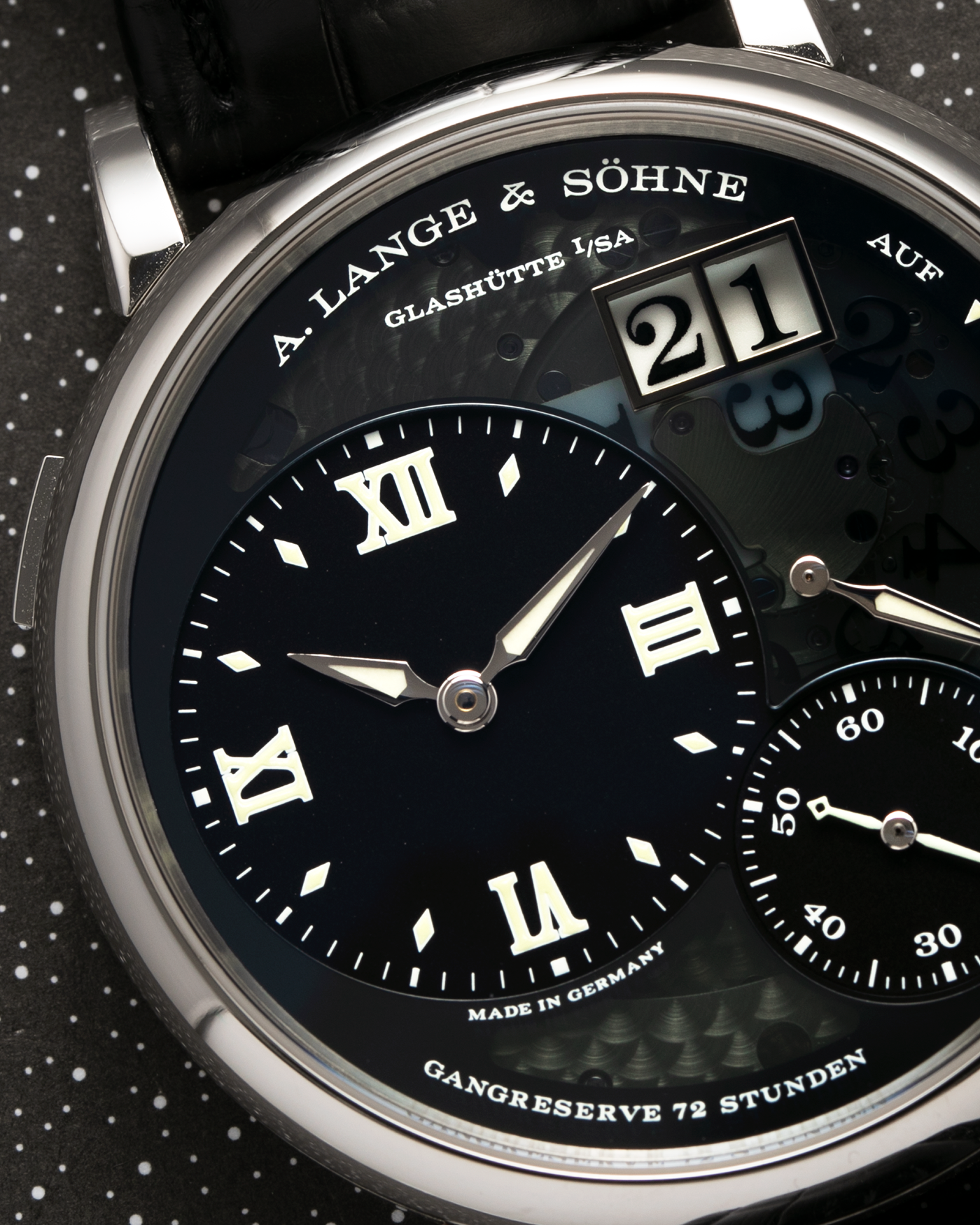 Brand: A. Lange & Sohne Year: 2014 Model: Grand Lange 1 Lumen Reference Number: 117.035 Material: Platinum Movement: Manual Winding L905.2 Case Diameter: 41mm Bracelet/Strap: A. Lange & Sohne Black Alligator Strap and Platinum Deployant Clasp