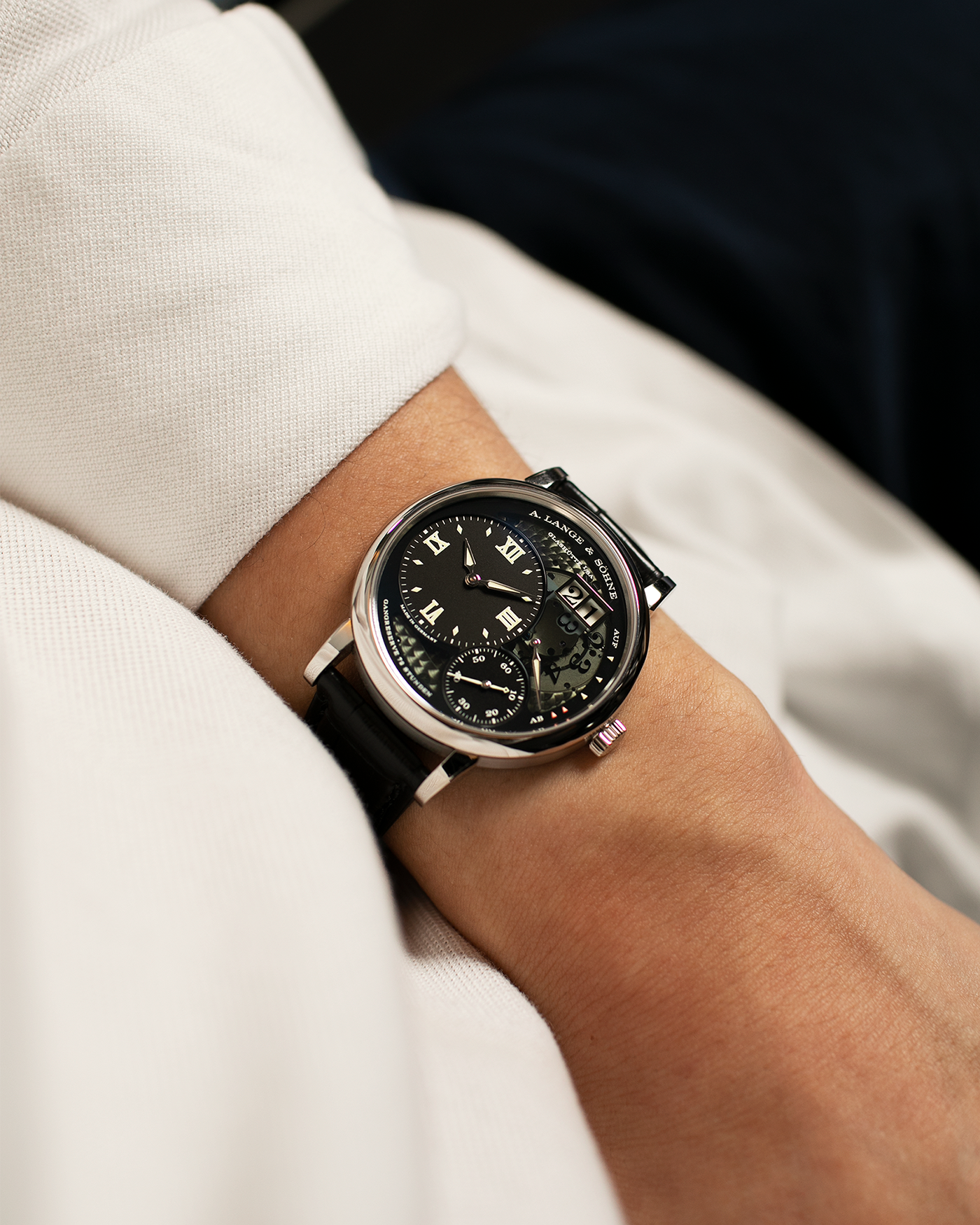 Brand: A. Lange & Sohne Year: 2014 Model: Grand Lange 1 Lumen Reference Number: 117.035 Material: Platinum Movement: Manual Winding L905.2 Case Diameter: 41mm Bracelet/Strap: A. Lange & Sohne Black Alligator Strap and Platinum Deployant Clasp