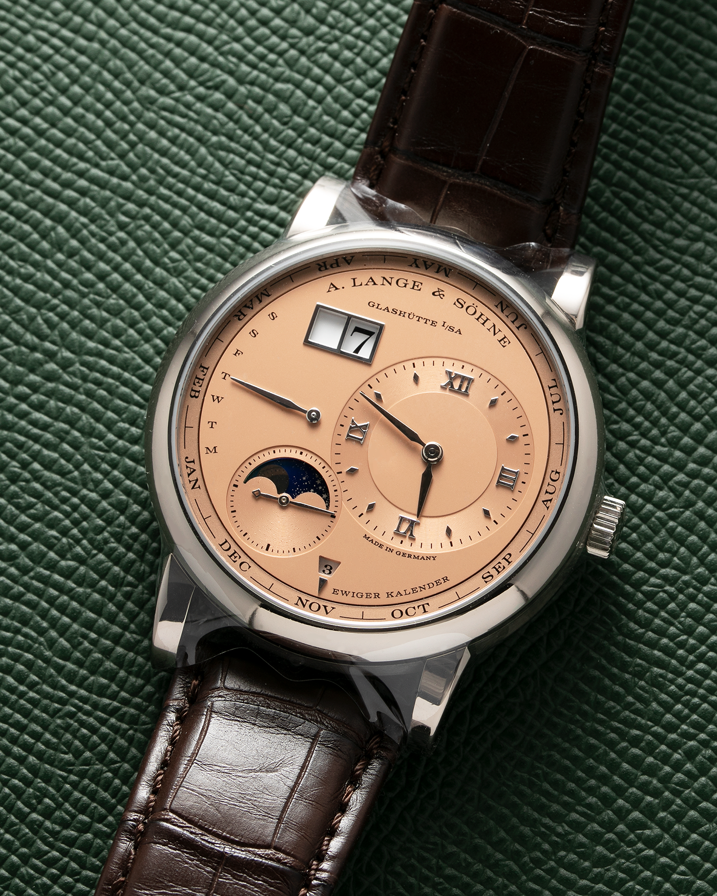 Brand: A. Lange & Söhne Year: 2021 Model: Lange 1 Reference Number: 345.056 Material: 18-carat White Gold Case, 18-carat Pink Gold Dial Movement: Cal. L021.3, Self-Winding Case Diameter: 41.9mm Bracelet/Strap: A. Lange & Söhne Dark Brown Alligator Strap with 18-carat White Gold Tang Buckle 