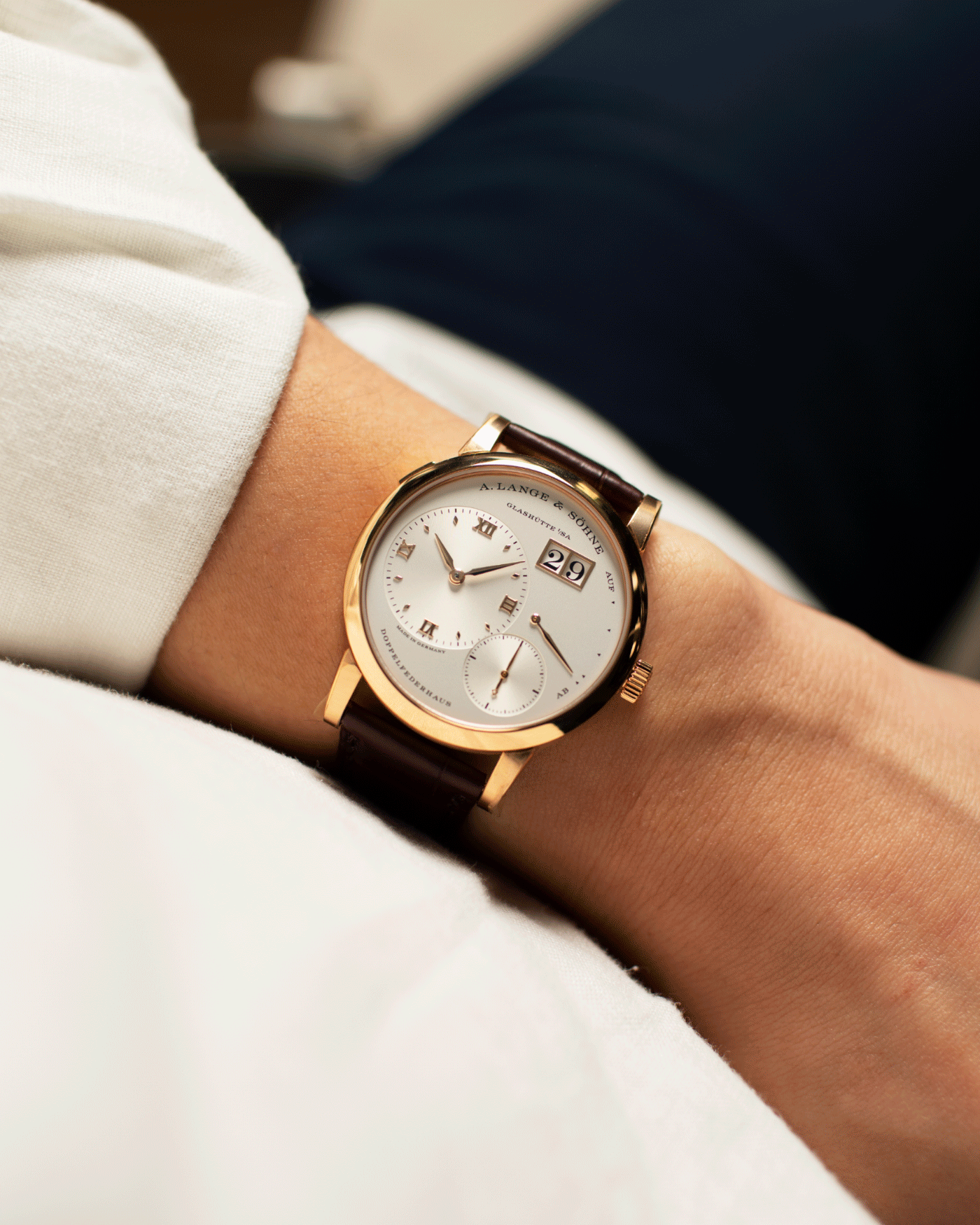 Brand: A. Lange & Sohne Year: 2021 Model: Lange 1 Reference Number: 191.032 Material: 18k Rose Gold Movement: Manual Winding L121.1 Case Diameter: 38.5mm Bracelet/Strap: Chestnut Brown Alligator Strap with 18k Rose Gold A. Lange & Sohne Tang Buckle