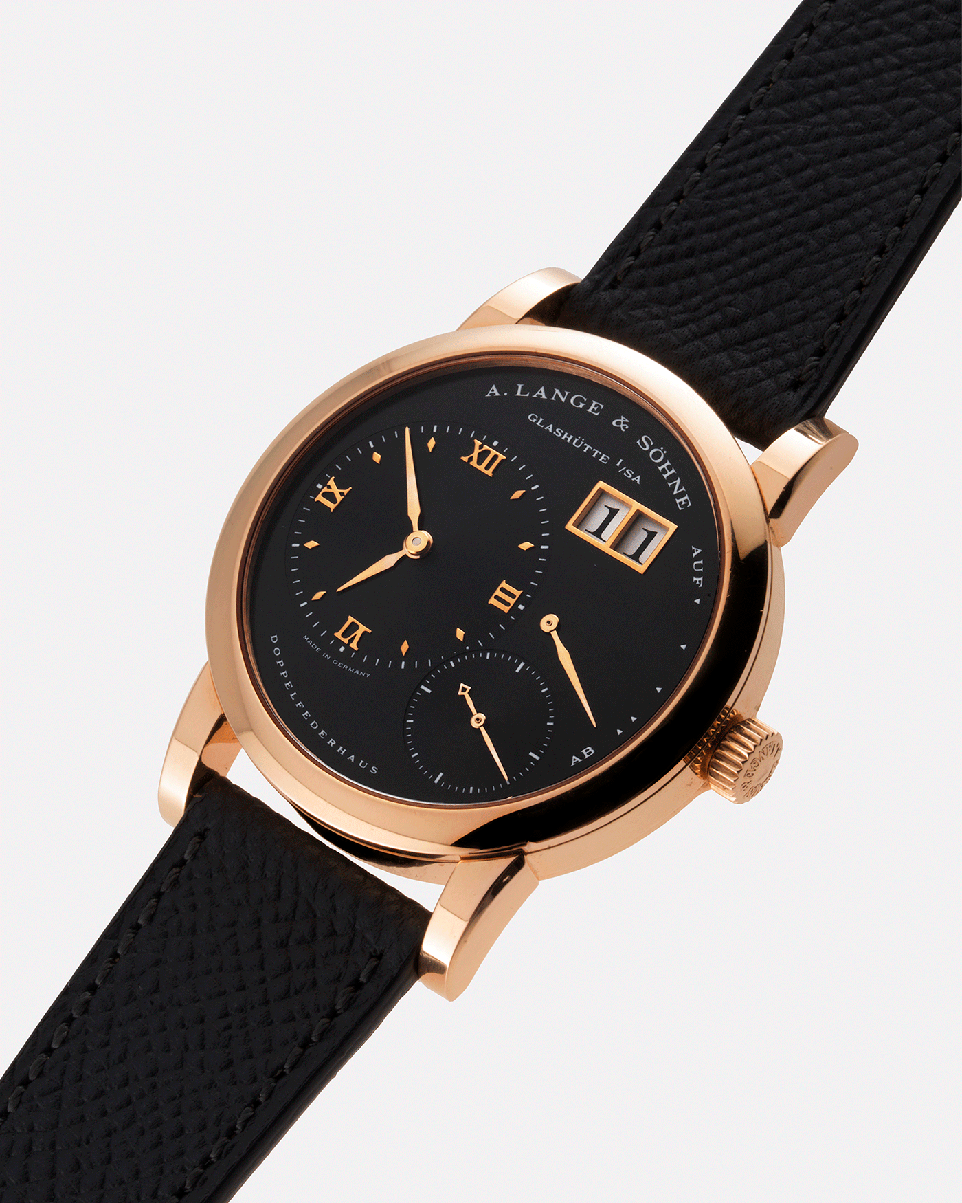 Brand: A. Lange & Sohne Year: 2004 Model: Lange 1 Reference Number: 101.031 Material: 18k Rose Gold Movement: Manual Winding L901.5 Case Diameter: 38.5mm Bracelet/Strap: Nostime Anthracite Textured Calf with 18k Rose Gold Tang Buckle