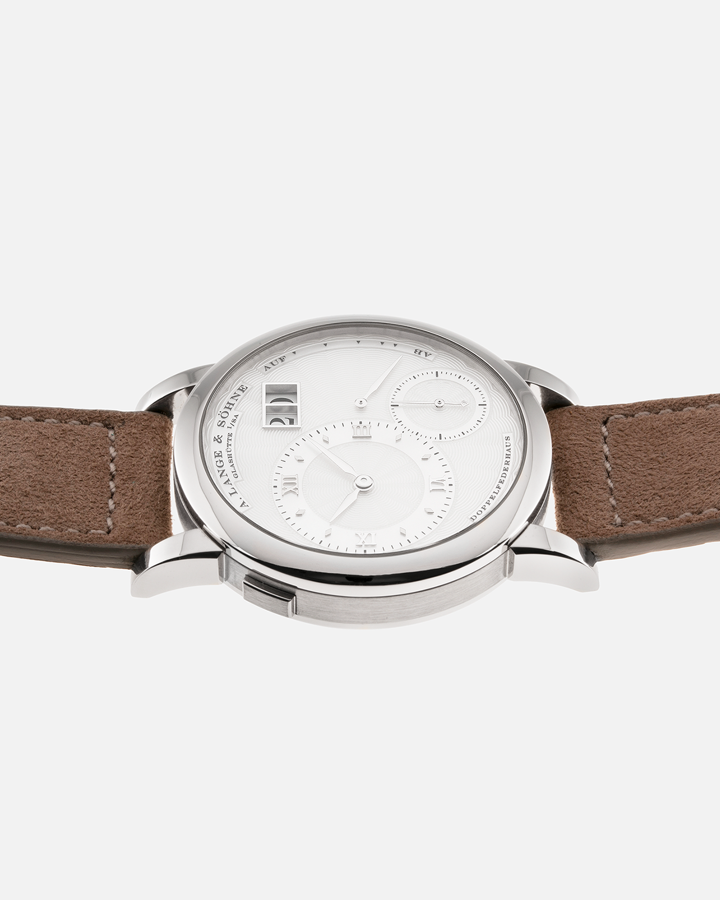 Brand: A. Lange & Sohne Year: 2000’s Model: Lange 1 Soiree Reference Number: 110.030 Material: 18k White Gold Movement: Manual Winding L901.5 Case Diameter: 38.5mm Bracelet/Strap: Molequin Taupe Suede with 18k White Gold Tang Buckle