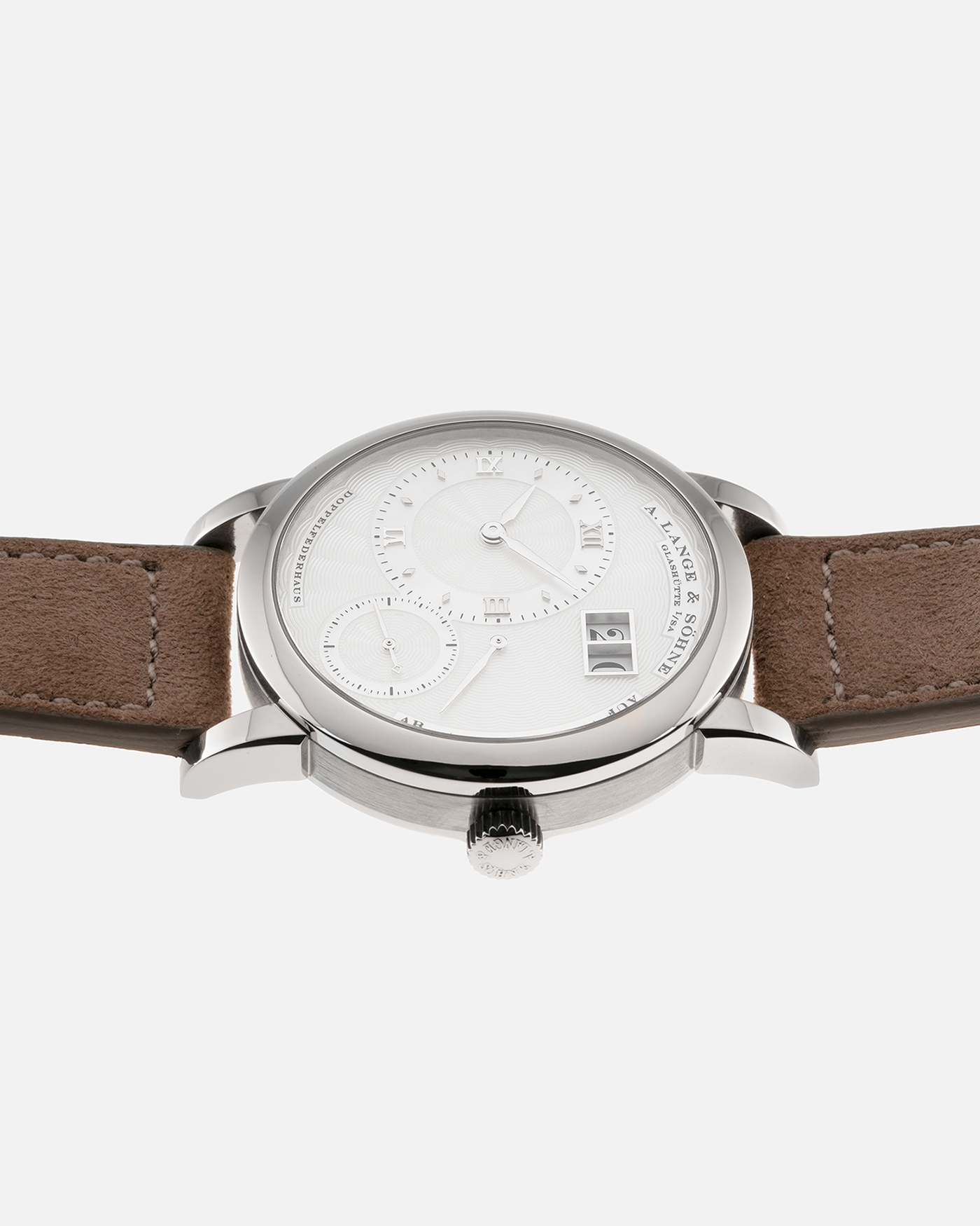 Brand: A. Lange & Sohne Year: 2000’s Model: Lange 1 Soiree Reference Number: 110.030 Material: 18k White Gold Movement: Manual Winding L901.5 Case Diameter: 38.5mm Bracelet/Strap: Molequin Taupe Suede with 18k White Gold Tang Buckle
