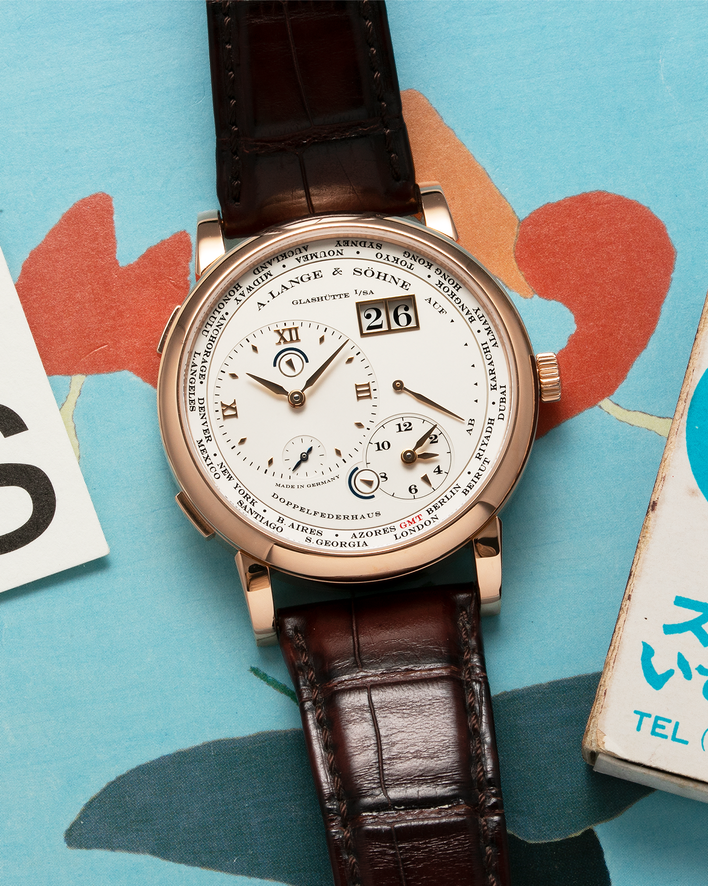 Brand: A. Lange & Sohne Year: 2015 Model: Lange 1 Time Zone (Zeit Zone) Reference Number: 116.032 Material: 18-carat Rose Gold Movement: Cal. L031.1, Manual Winding Case Diameter: 41.9mm Bracelet/Strap: A. Lange & Sohne Reddish Brown Alligator Strap with signed 18-carat Rose Gold Tang Buckle