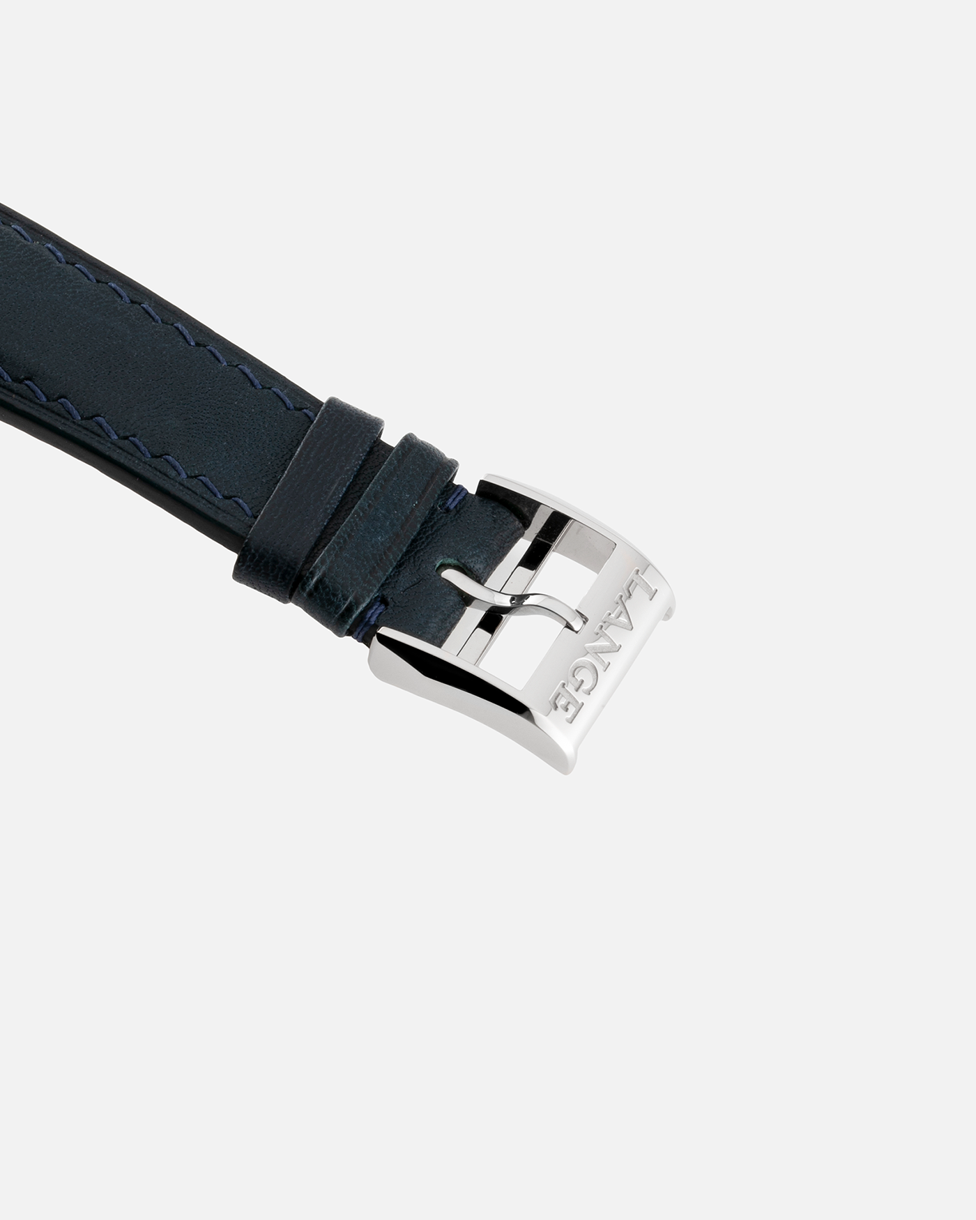 Brand: A. Lange & Söhne Year: 2017 Model: Lange 1 Reference Number: 191.028 Material: 18-carat White Gold Movement: Cal. L121.1, Manual-Winding Case Diameter: 38.5mm Bracelet/Strap: Dark Blue Calf Strap and A. Lange & Söhne Dark Blue Alligator Leather with Signed Tang Buckle 