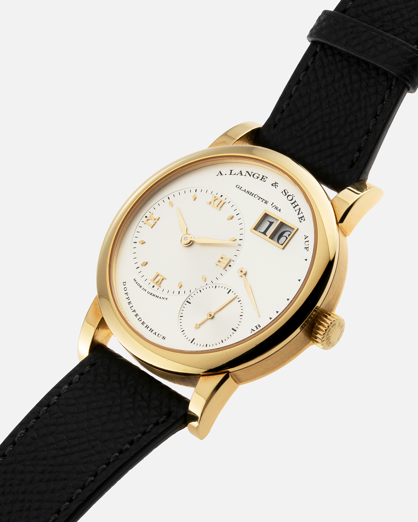 Brand: A. Lange & Söhne Year: 2000’s Model: Lange 1 Reference Number: 101.027 Material: 18-carat Yellow Gold Movement: Cal. L901.0, Manual-Winding Case Diameter: 38.5mm Bracelet/Strap: Molequin Anthracite Textured Calf Strap and A. Lange & Sohne Black Alligator Strap with 18k Yellow Gold Tang Buckle