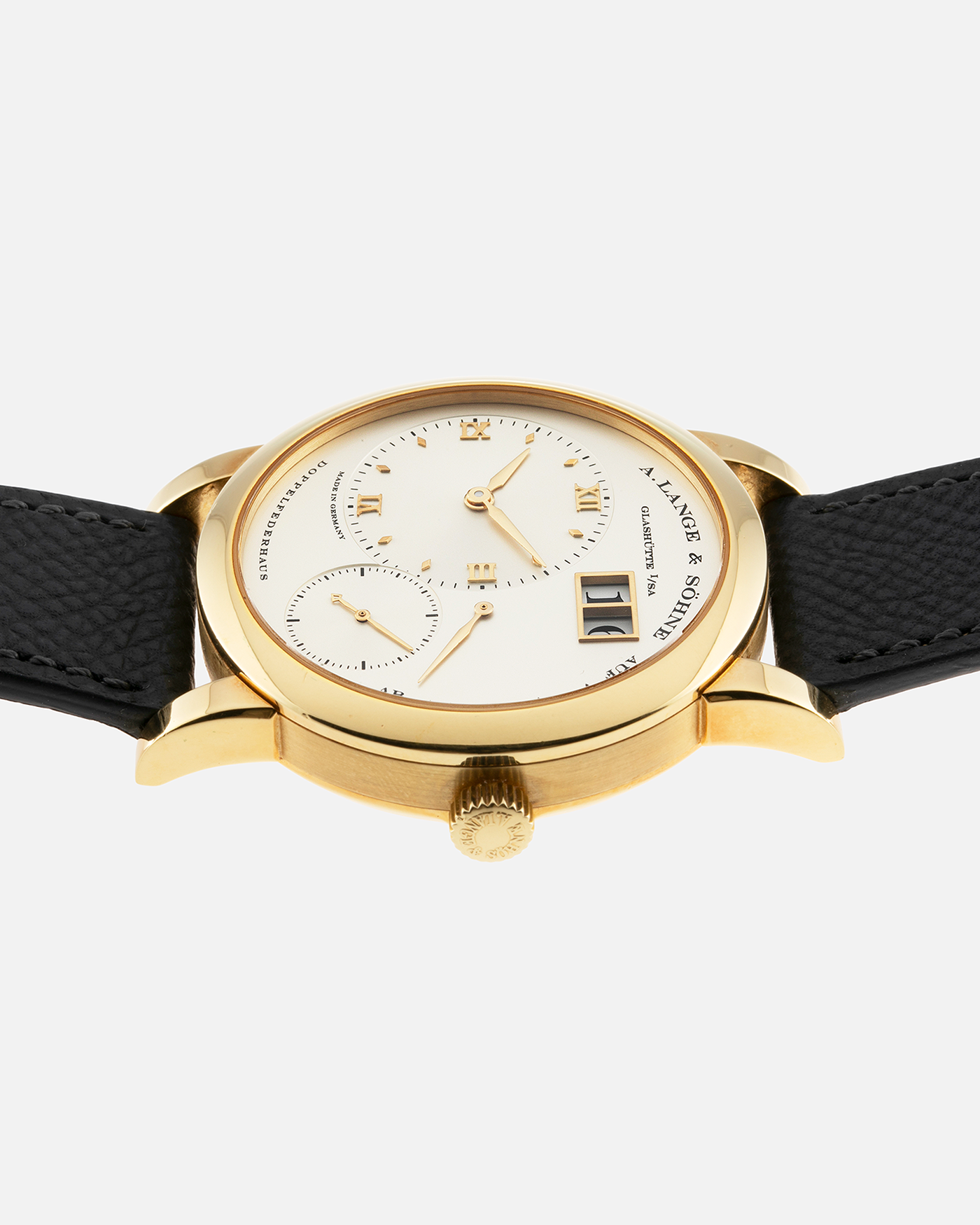 Brand: A. Lange & Söhne Year: 2000’s Model: Lange 1 Reference Number: 101.027 Material: 18-carat Yellow Gold Movement: Cal. L901.0, Manual-Winding Case Diameter: 38.5mm Bracelet/Strap: Molequin Anthracite Textured Calf Strap and A. Lange & Sohne Black Alligator Strap with 18k Yellow Gold Tang Buckle