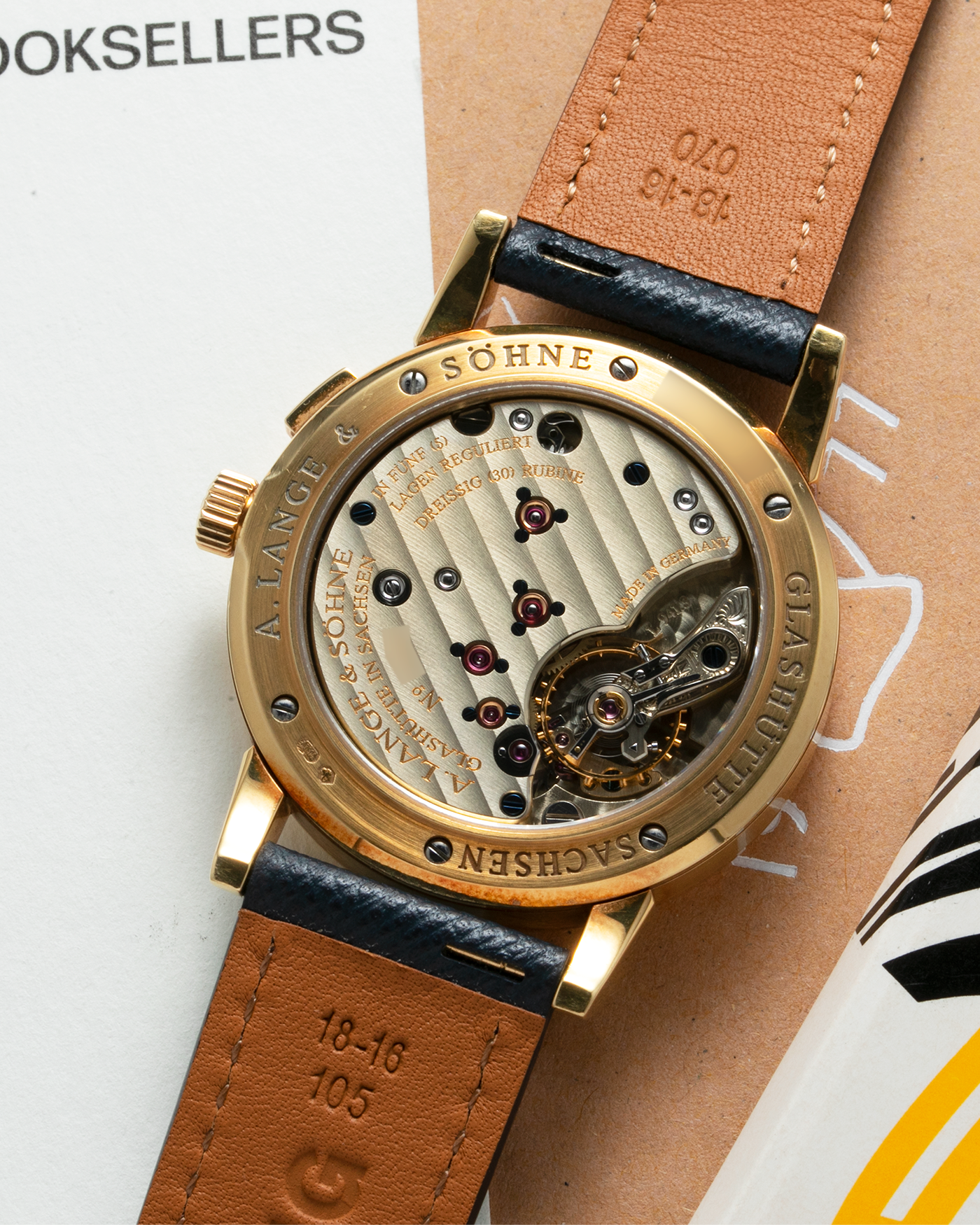 Brand: A. Lange & Sohne Year: Between 1994 - 1996 Model: Saxonia   Reference Number: 102.011 Material: 18-carat Yellow Gold Movement: Cal. L911.3, Manual-Wind Case Diameter: 34mm x 9.1mm Bracelet/Strap: Navy Blue Molequin Textured Leather and A. Lange & Sohne Black Alligator with Signed 18-carat Yellow Gold Tang Buckle