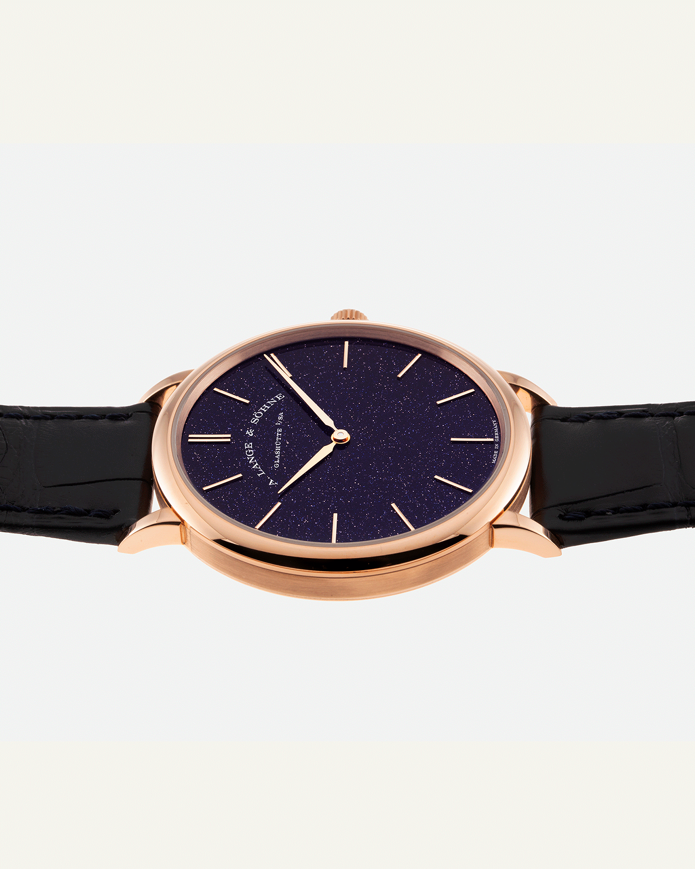 Brand: A. Lange & Sohne Year: 2021 Model: Saxonia Thin Adventurine Ref Number: 211.088 Material: 18k Rose Gold Movement: Manual Winding In-House Cal. L093.1 Case Diameter: 38mm Bracelet/Strap: A. Lange & Sohne Dark Blue Alligator Strap with signed 18k Rose Gold Tang Buckle