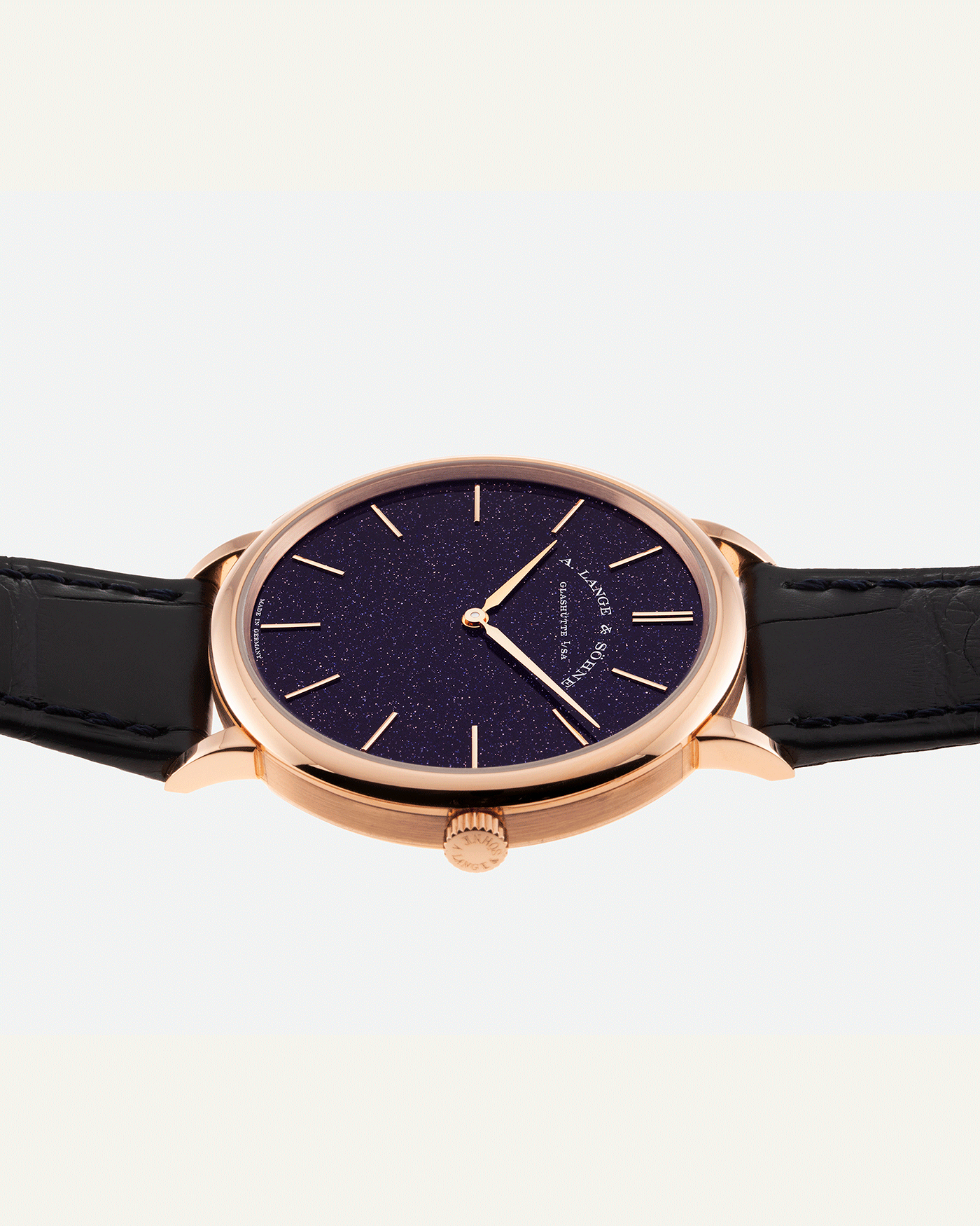 Brand: A. Lange & Sohne Year: 2021 Model: Saxonia Thin Adventurine Ref Number: 211.088 Material: 18k Rose Gold Movement: Manual Winding In-House Cal. L093.1 Case Diameter: 38mm Bracelet/Strap: A. Lange & Sohne Dark Blue Alligator Strap with signed 18k Rose Gold Tang Buckle