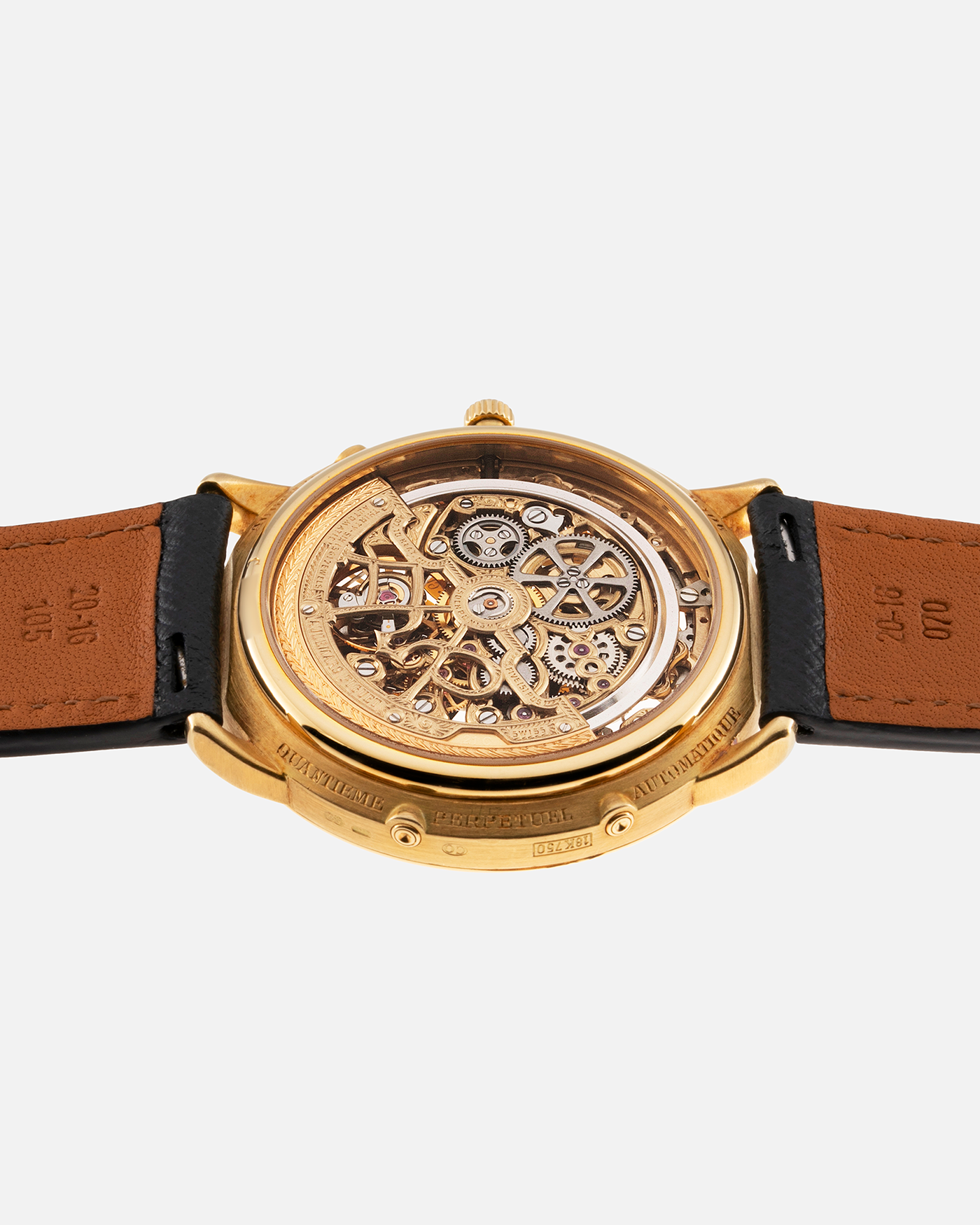 Brand: Audemars Piguet Year: 1980’s Model: Quantieme Perpetual Calendar Openworked Reference Number: 25668BA Material: 18k Yellow Gold Movement: Cal. 2120/2800 Case Diameter: 39mm Bracelet: Molequin Navy Blue Textured Calf and 18k Yellow Gold Audemars Piguet Tang Buckle with additional Audemars Piguet Purple Crocodile Strap