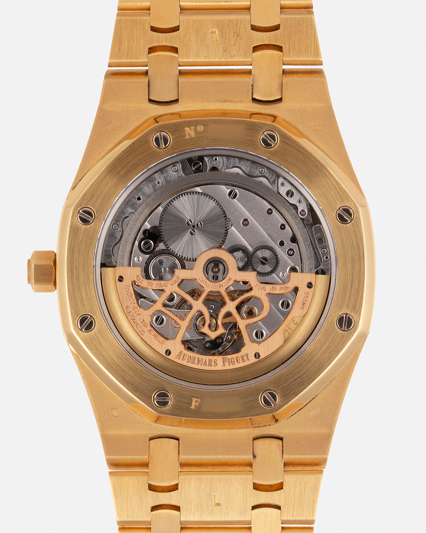 Brand: Audemars Piguet Year: 2006 Model: Royal Oak Reference Number: 15202BA Material: 18k Yellow Gold Movement: Cal 2121 Case Diameter: 39mm Bracelet: Audemars Piguet Integrated 18k Yellow Gold Bracelet