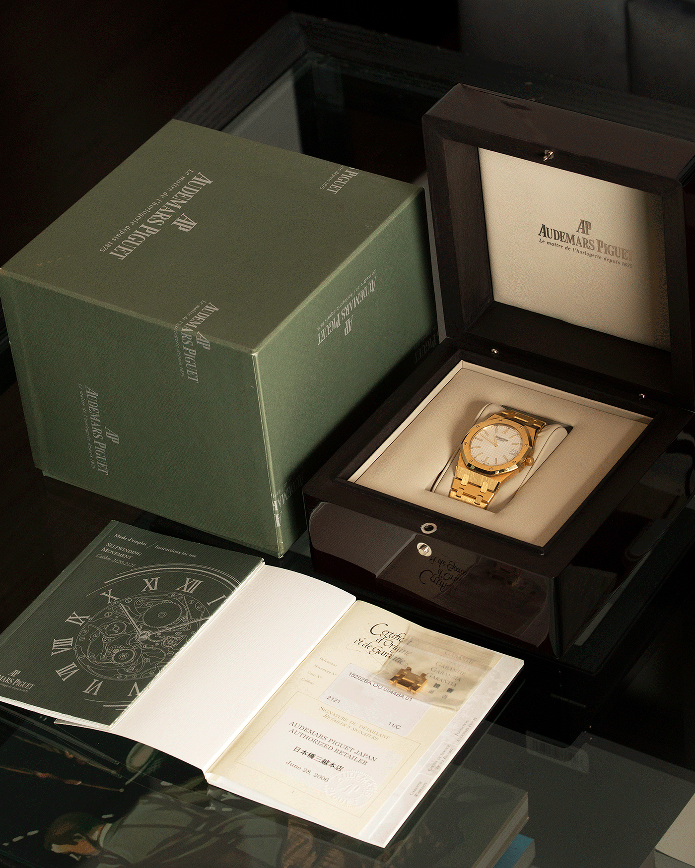 Brand: Audemars Piguet Year: 2006 Model: Royal Oak Reference Number: 15202BA Material: 18k Yellow Gold Movement: Cal 2121 Case Diameter: 39mm Bracelet: Audemars Piguet Integrated 18k Yellow Gold Bracelet
