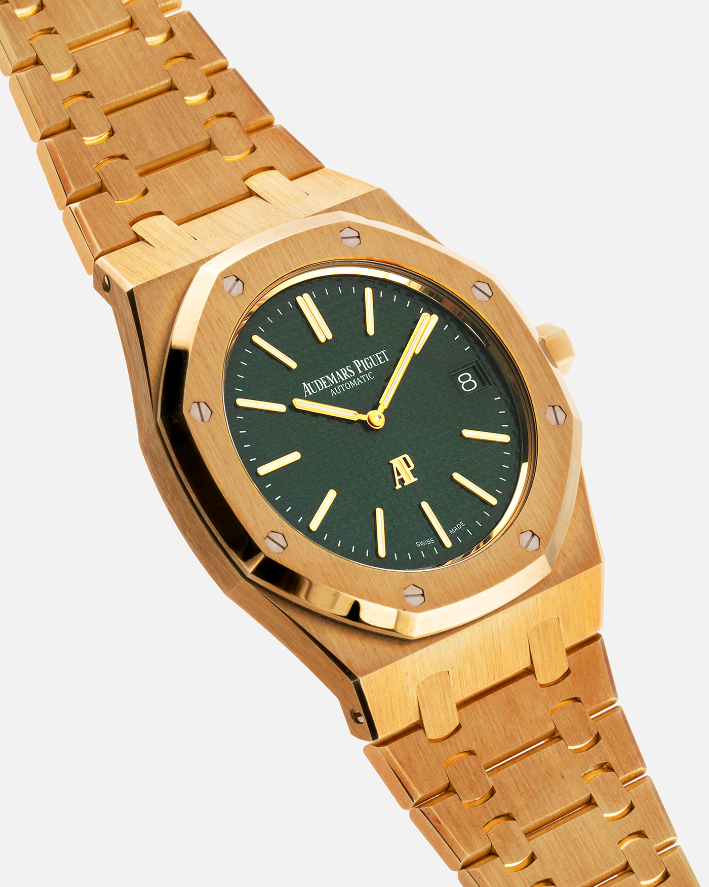 Brand: Audemars Piguet Year: 2015 Model: Royal Oak The Hour Glass Edition Reference Number: 15205 / 15202 Material: 18ct Yellow Gold Movement: Cal 2121 Case Diameter: 39mm Bracelet: Audemars Piguet Integrated 18ct Yellow Gold Bracelet