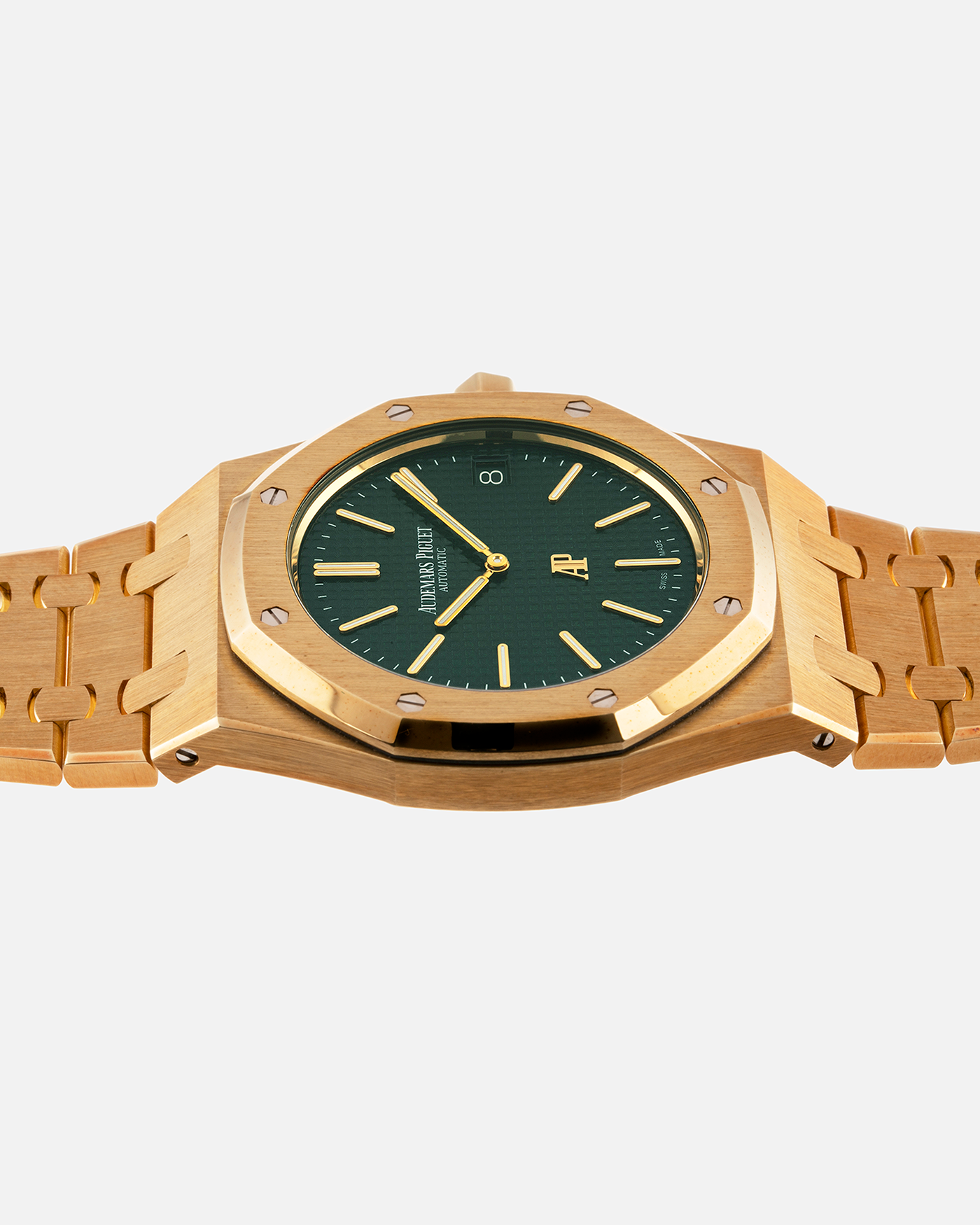 Brand: Audemars Piguet Year: 2015 Model: Royal Oak The Hour Glass Edition Reference Number: 15205 / 15202 Material: 18ct Yellow Gold Movement: Cal 2121 Case Diameter: 39mm Bracelet: Audemars Piguet Integrated 18ct Yellow Gold Bracelet