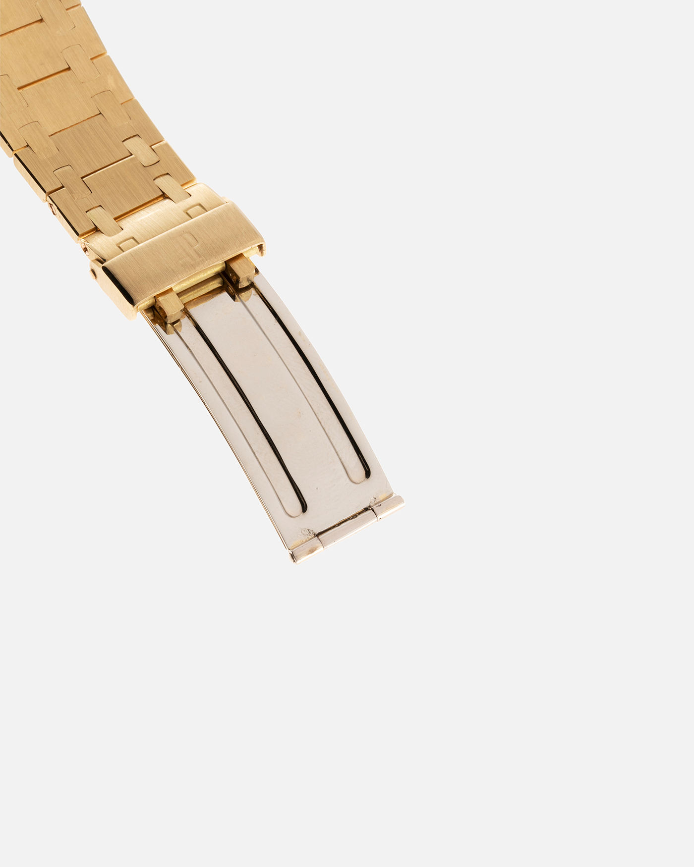 Brand: Audemars Piguet Year: 1980’s Model: Royal Oak Reference Number: 5402BA Material: 18-carat Yellow Gold Movement: Cal 2121 Case Diameter: 39mm Bracelet: Audemars Piguet Integrated 18-carat Yellow Gold Bracelet