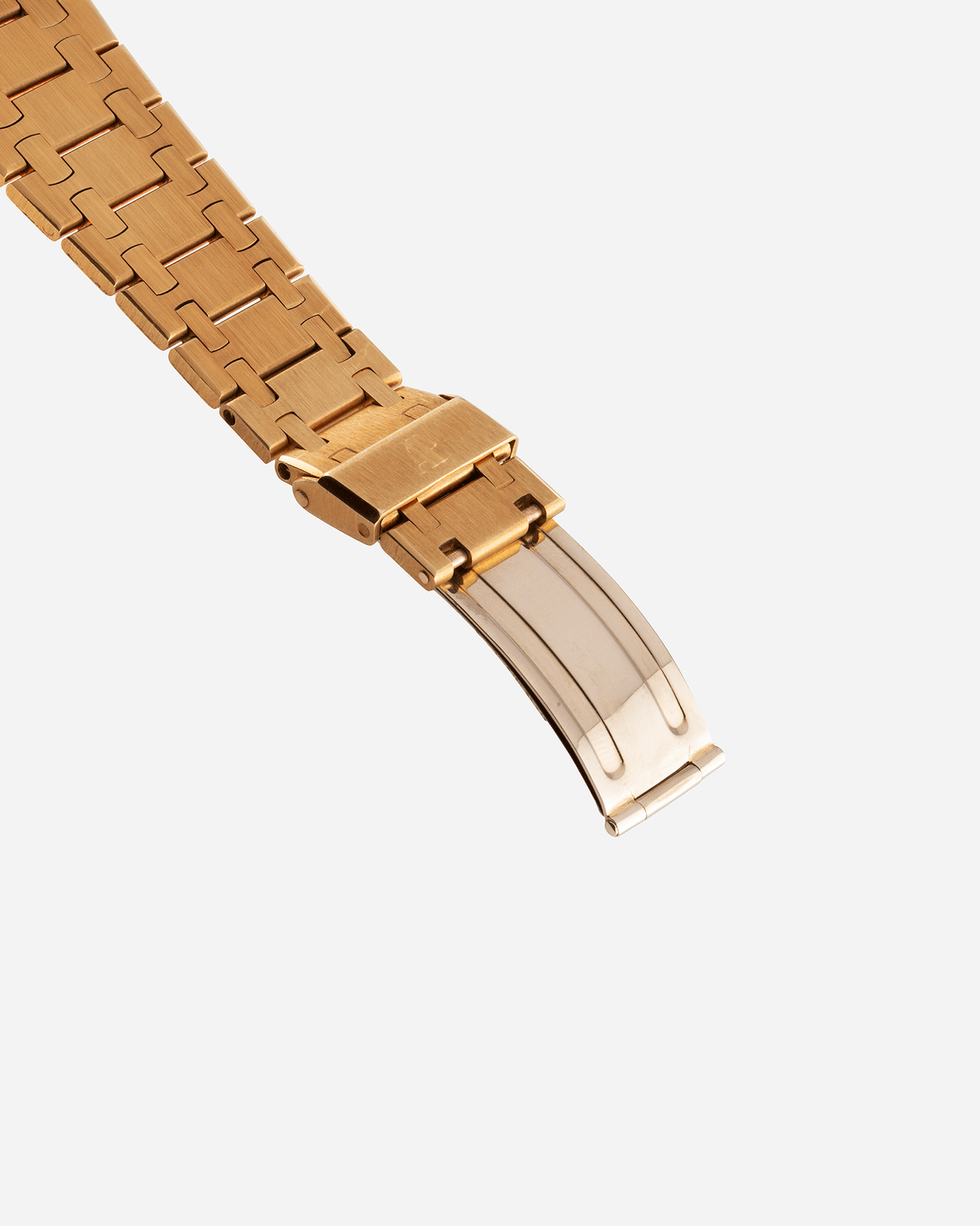 Brand: Audemars Piguet Year: 1980’s Model: Royal Oak Reference Number: 5402BA Material: 18k Yellow Gold Movement: Cal 2121 Case Diameter: 39mm Bracelet: Audemars Piguet Integrated 18k Yellow Gold Bracelet