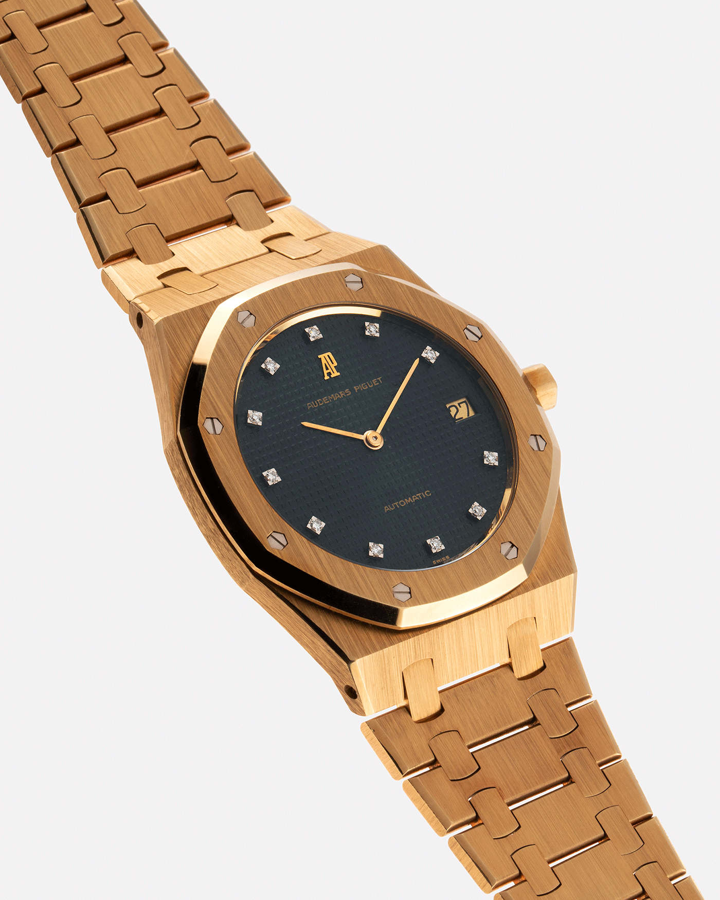Brand: Audemars Piguet Year: 1980’s Model: Royal Oak Reference Number: 5402BA Material: 18k Yellow Gold Movement: Cal 2121 Case Diameter: 39mm Bracelet: Audemars Piguet Integrated 18k Yellow Gold Bracelet