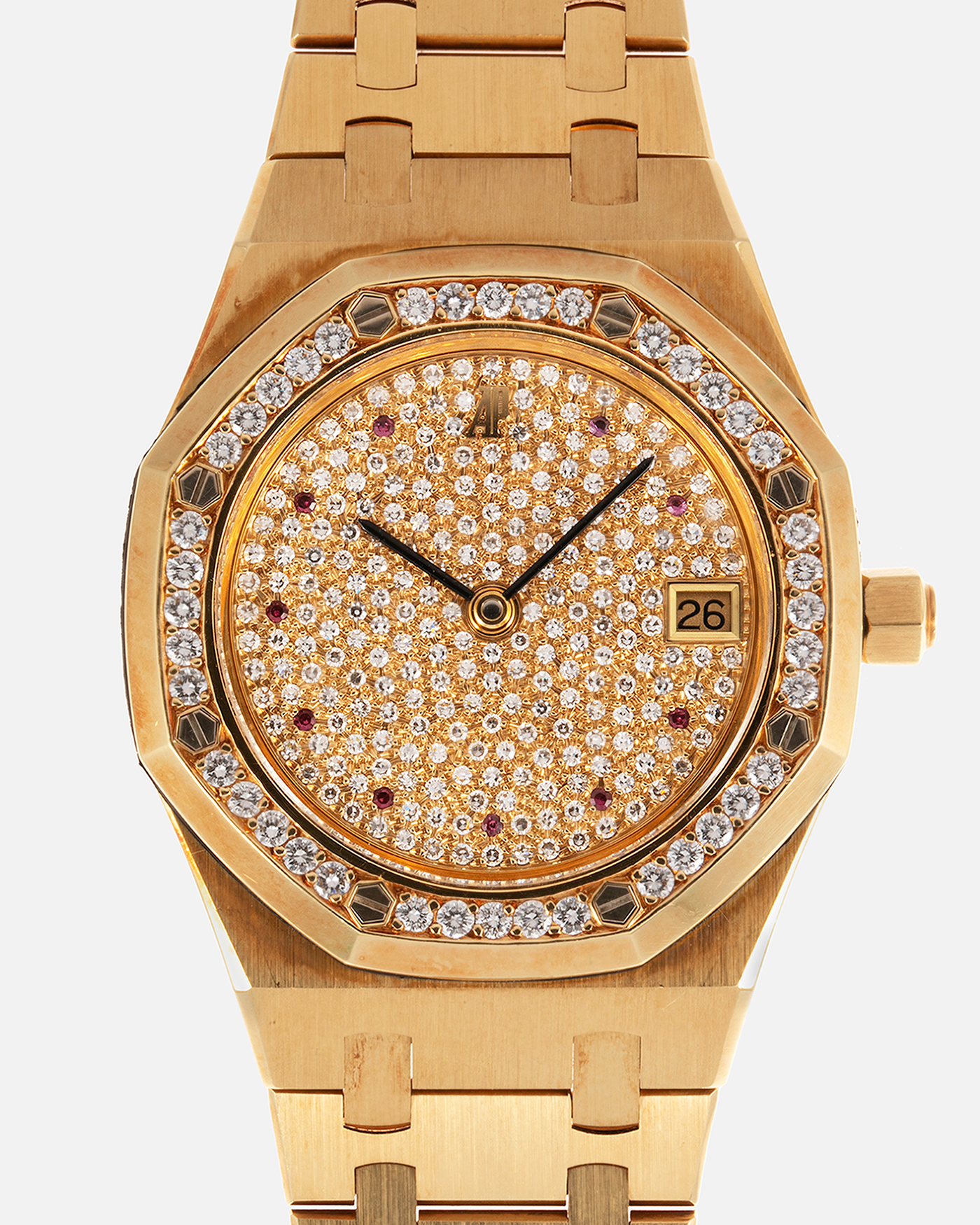 Brand: Audemars Piguet Year: 1990’s Model: Royal Oak “Rubies” Reference Number: 14813BA Material: 18-carat Yellow Gold with Diamond Dial and Bezel Movement: Cal. 2225, Self-Winding Case Diameter: 36mm Strap: Audemars Piguet Integrated 18-carat Yellow Gold Bracelet