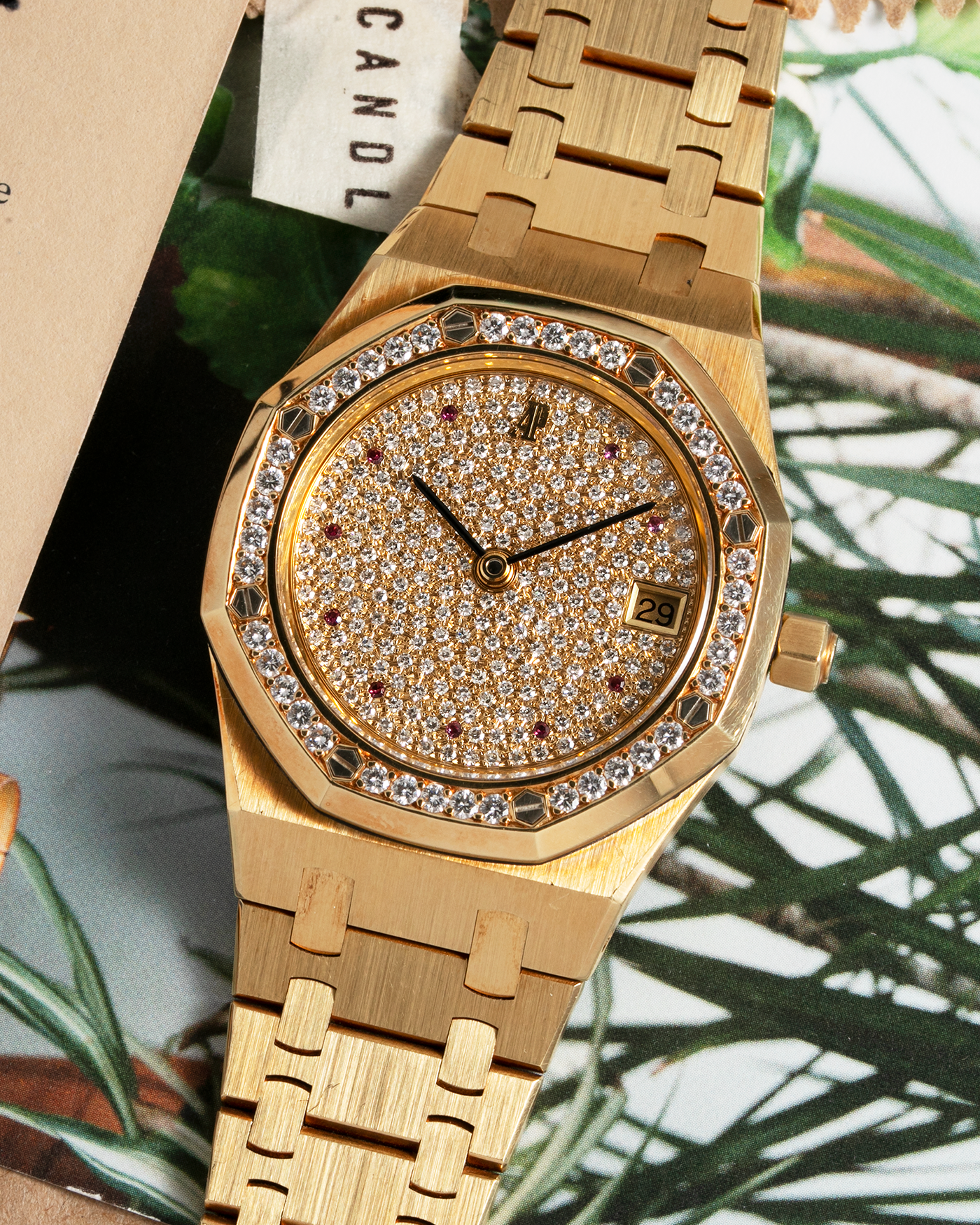 Brand: Audemars Piguet Year: 1990’s Model: Royal Oak “Rubies” Reference Number: 14813BA Material: 18-carat Yellow Gold with Diamond Dial and Bezel Movement: Cal. 2225, Self-Winding Case Diameter: 36mm Strap: Audemars Piguet Integrated 18-carat Yellow Gold Bracelet