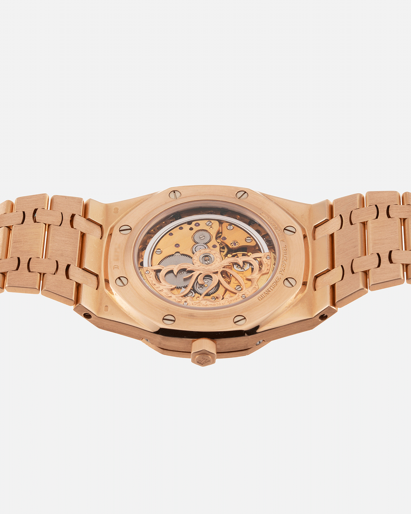 Brand: Audemars Piguet Year: 1995 Model: Royal Oak Reference Number: 25810 Material: 18k Rose Gold Movement: Cal. 2120/2802 Case Diameter: 39mm Bracelet: 18k Rose Gold Audemars Piguet Integrated Bracelet